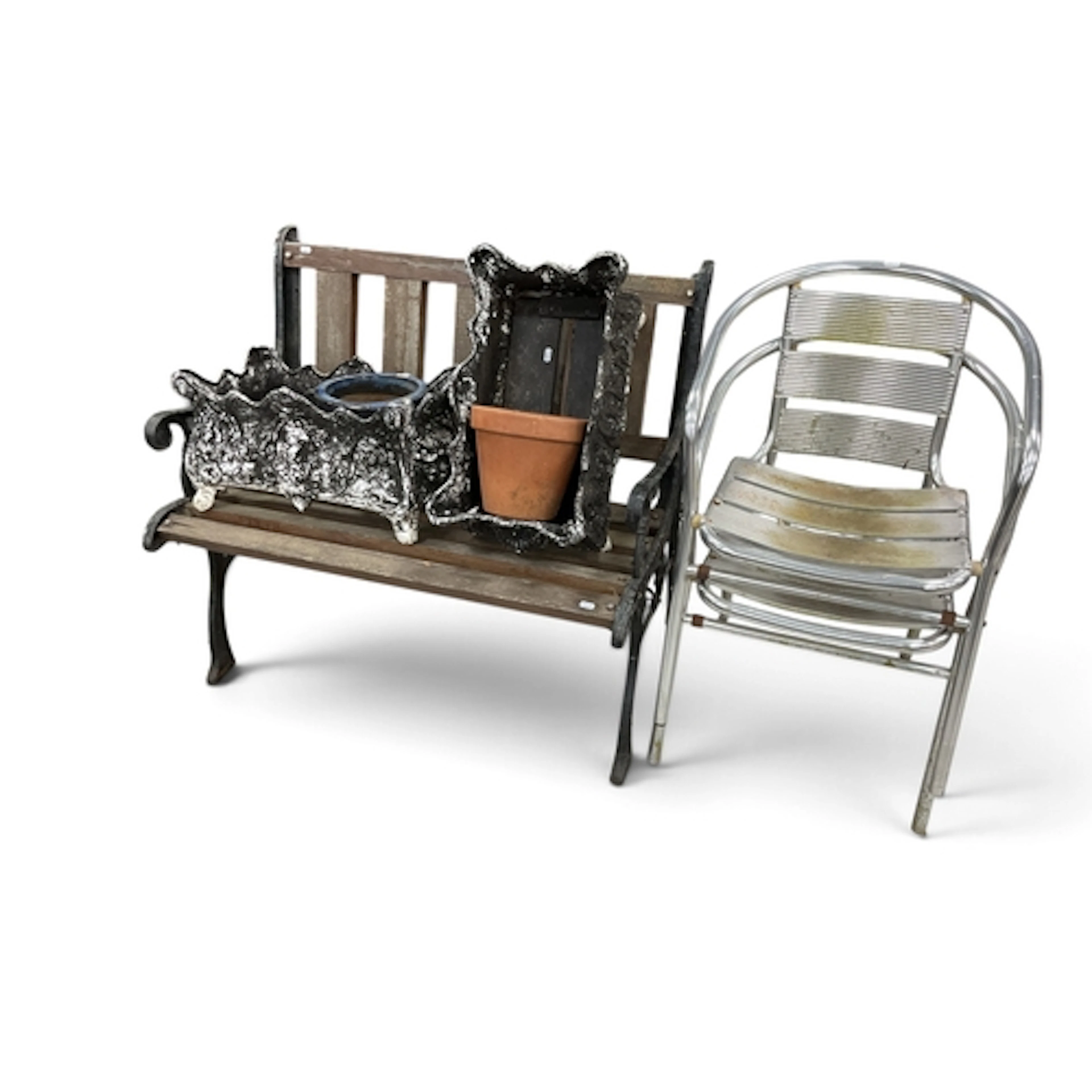 Garden furniture and planters, including a cast iron and woo...