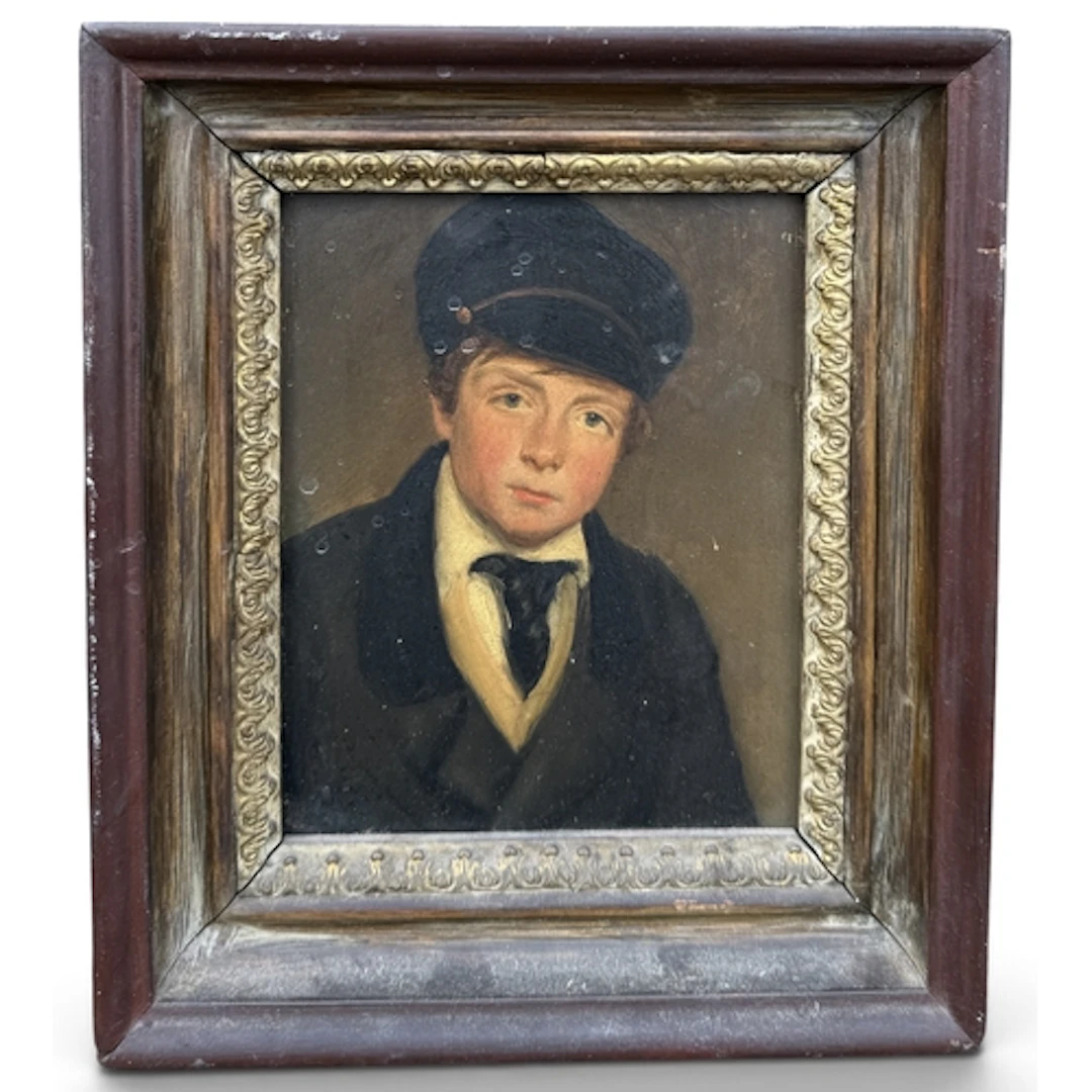A LATE VICTORIAN PORTRAIT OF A BOY WEARING CAP AND TIE Oil o...