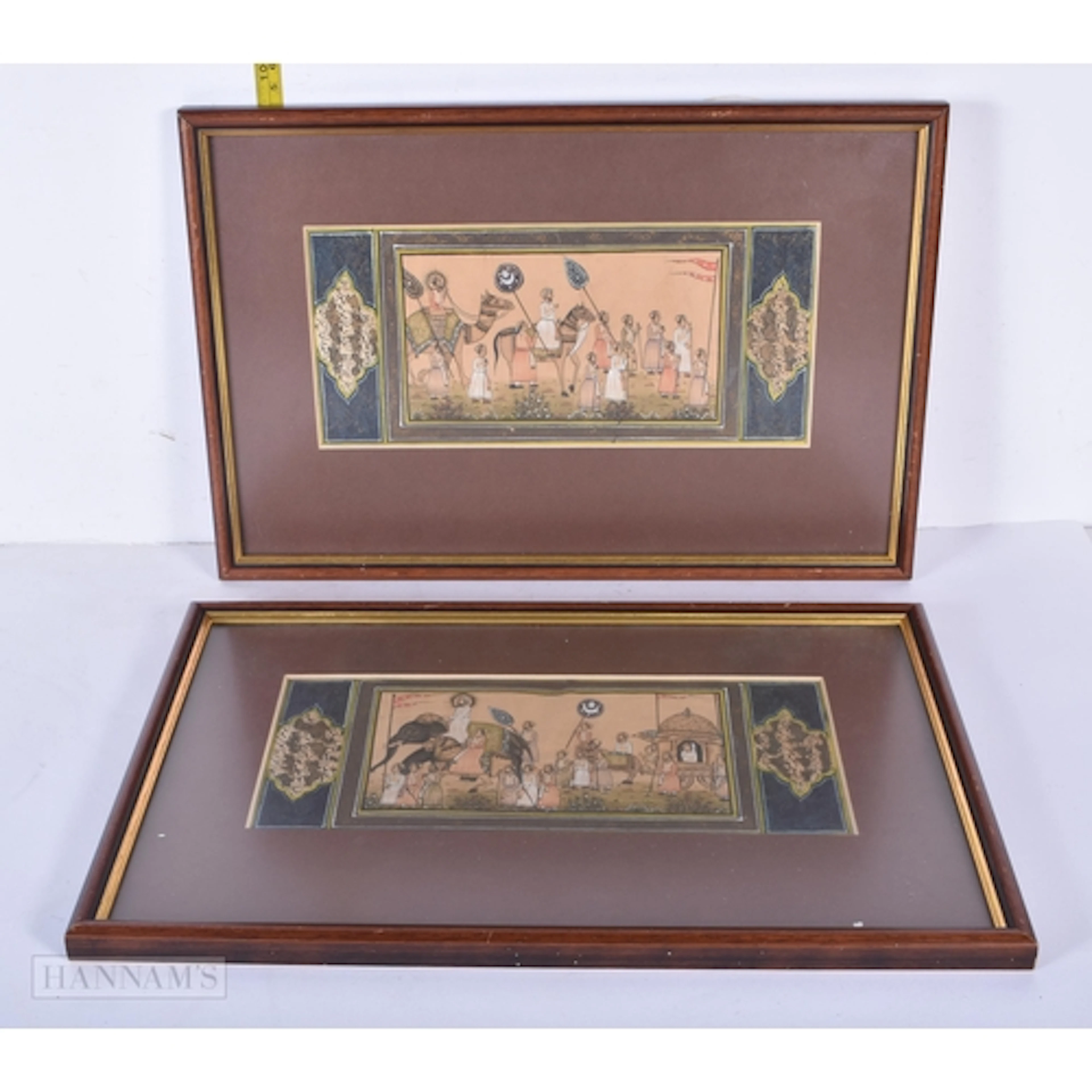 A pair of framed Indian Mughal watercolours depicting a Roya...