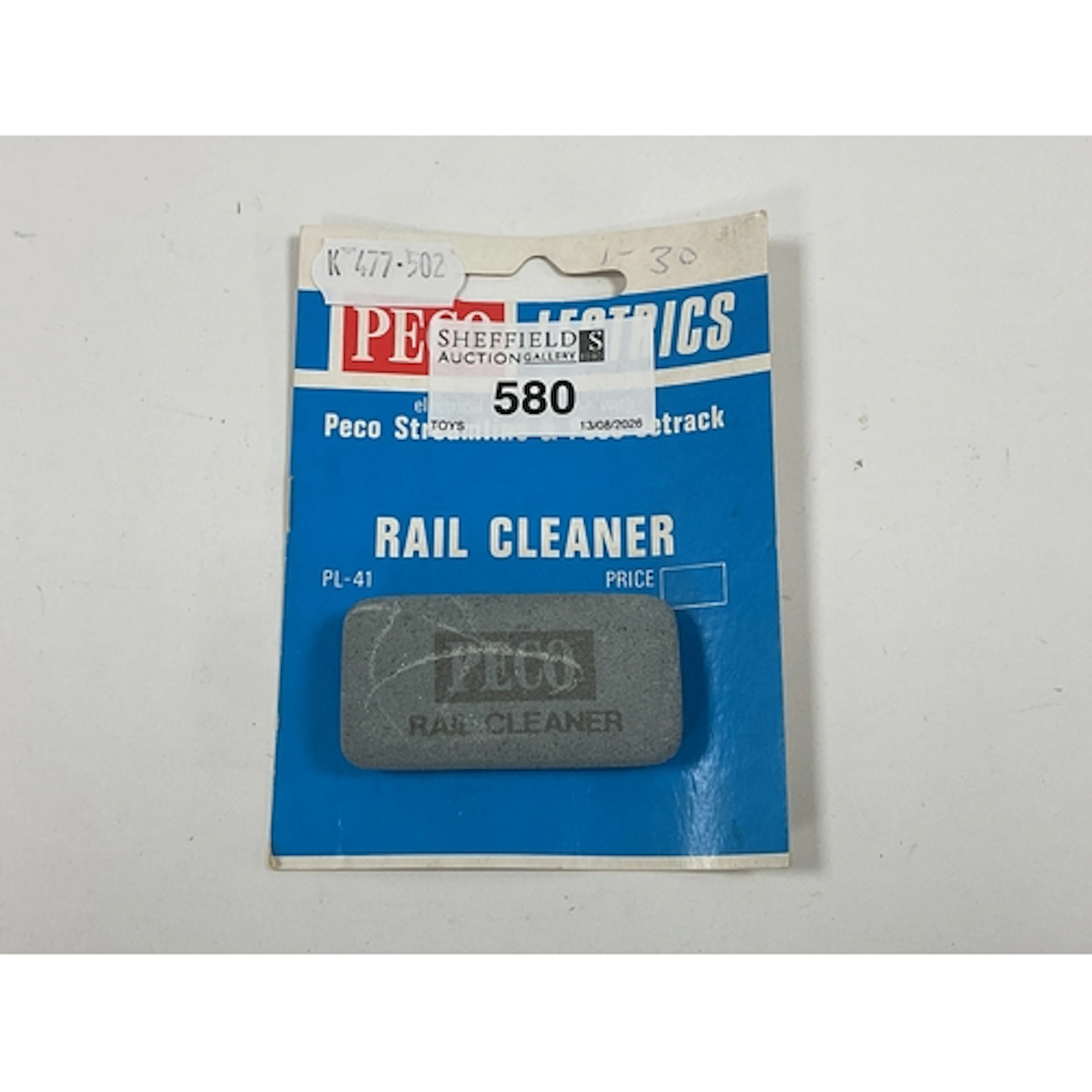 Auctioneers Challenge - A Peco Track Cleaning Rubber, carded...