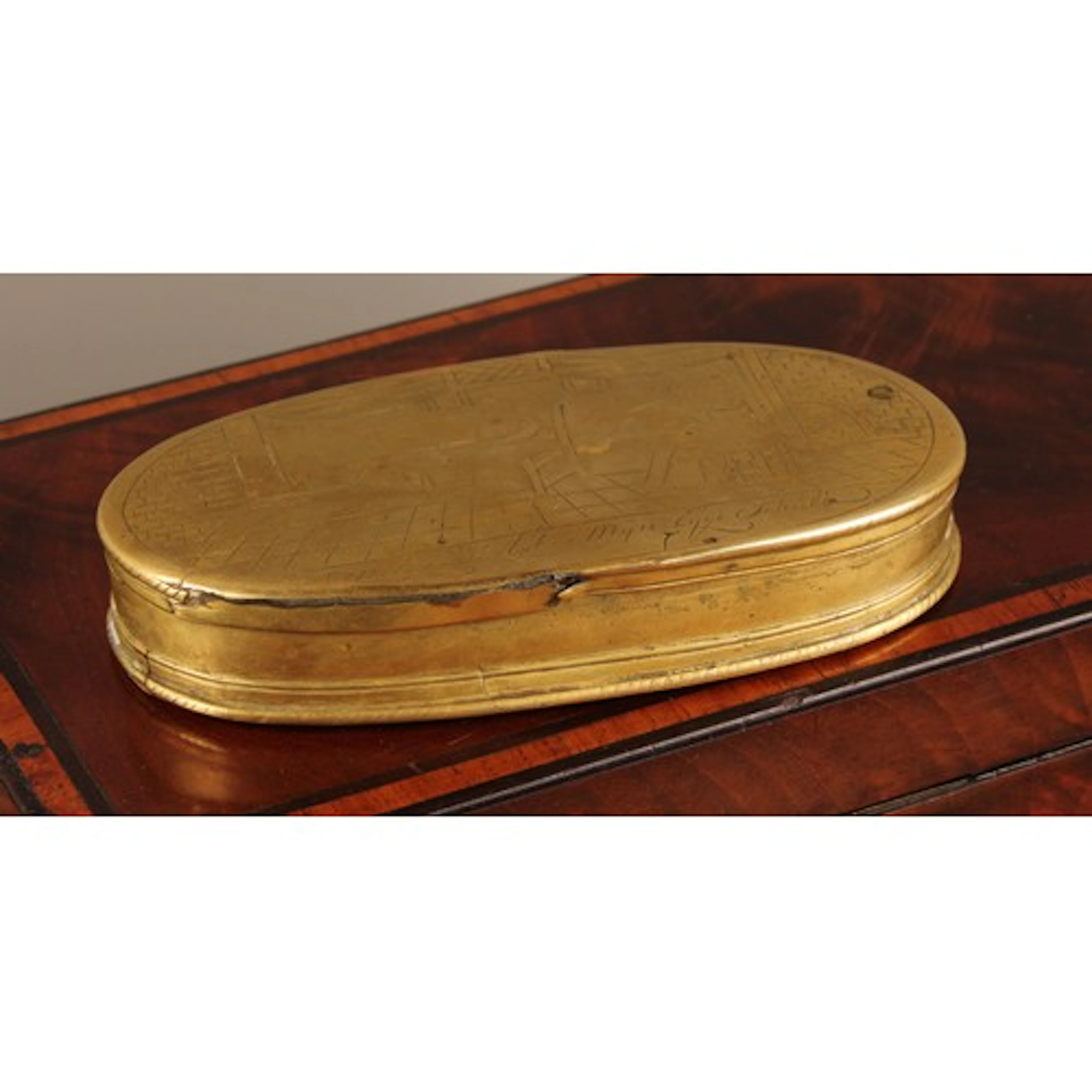 An 18th century Anglo-Dutch brass oval snuff or tobacco box,...