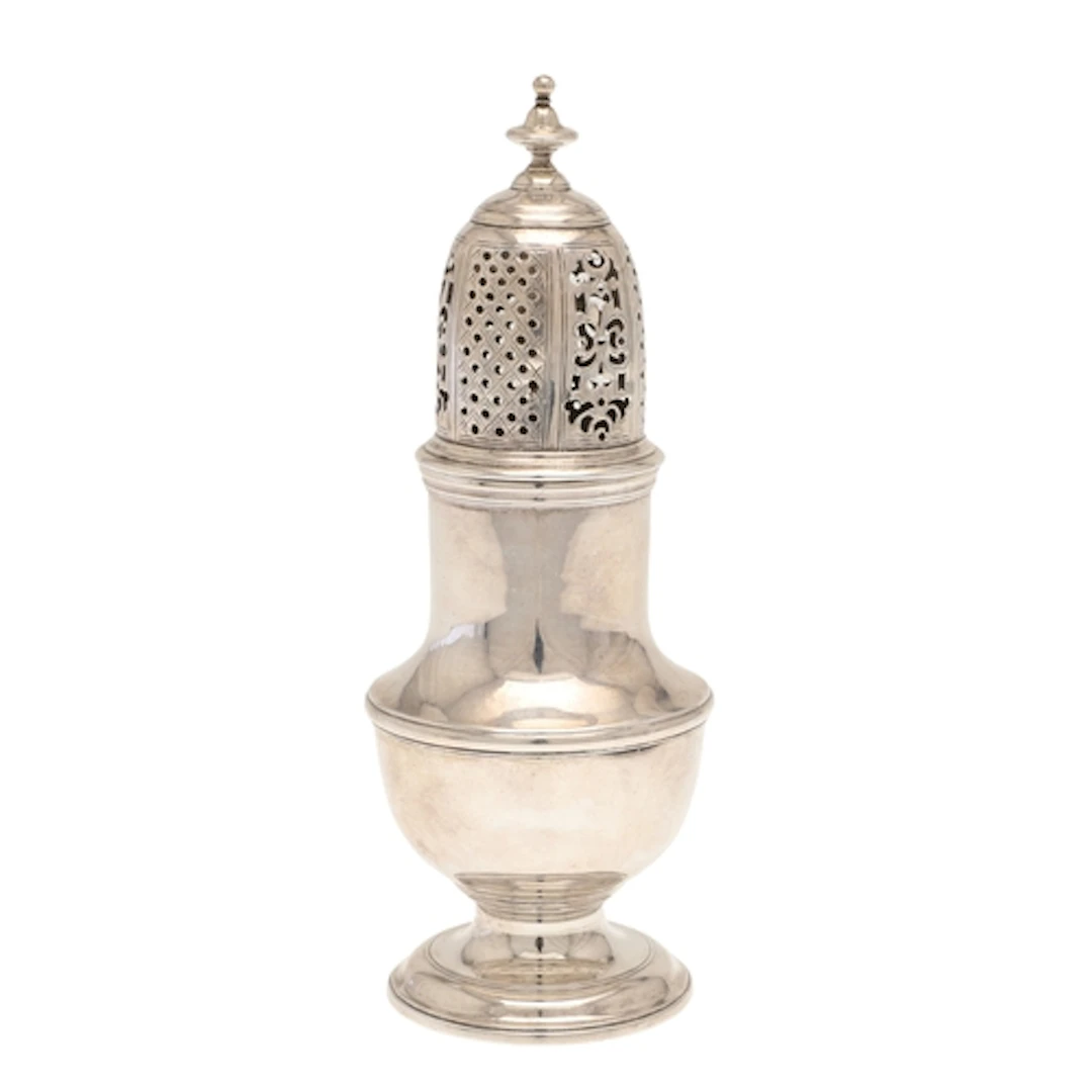 A GEORGE II SILVER SUGAR CASTER. Of baluster form on a round...