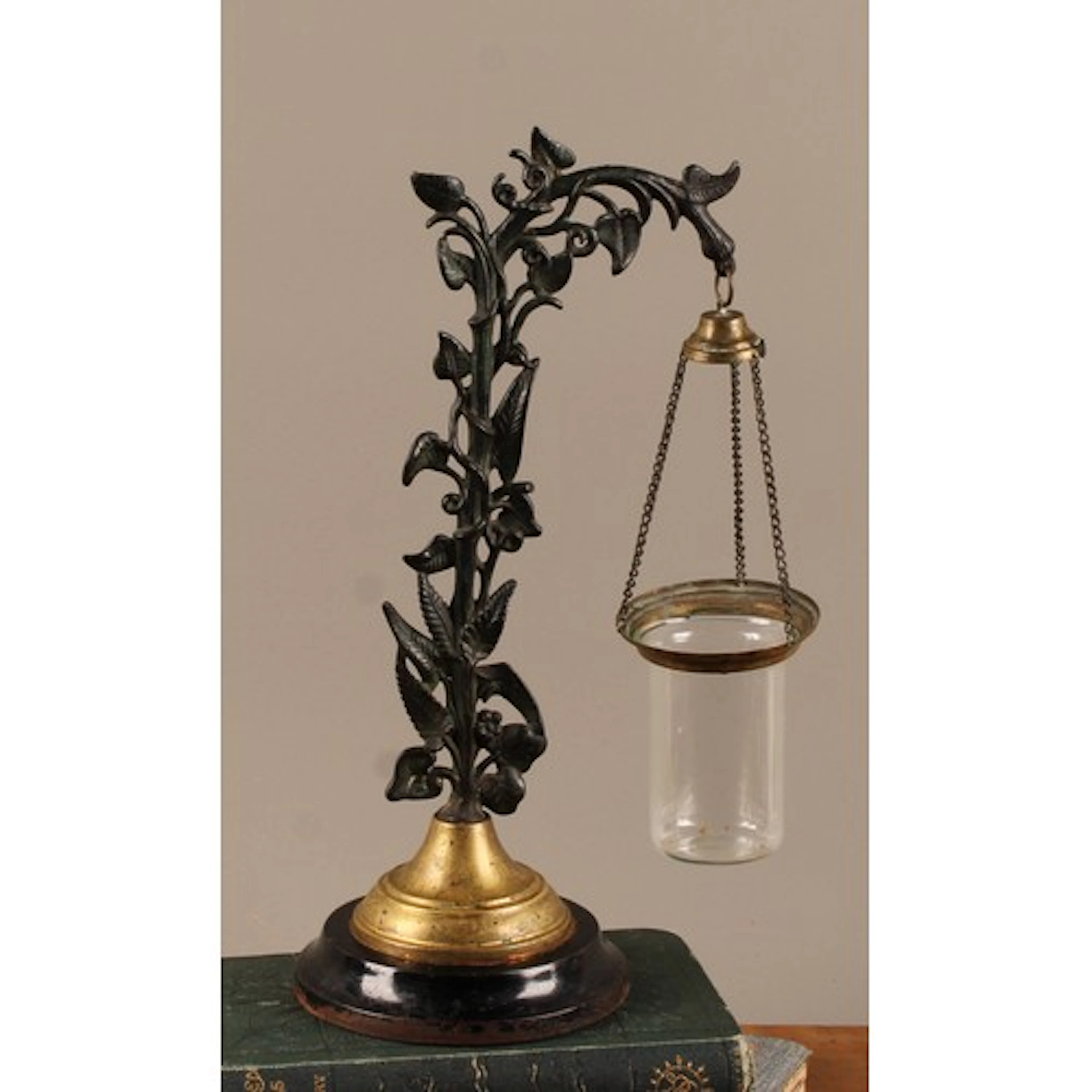 A 19th century cast iron and brass flower posy as a tall flo...