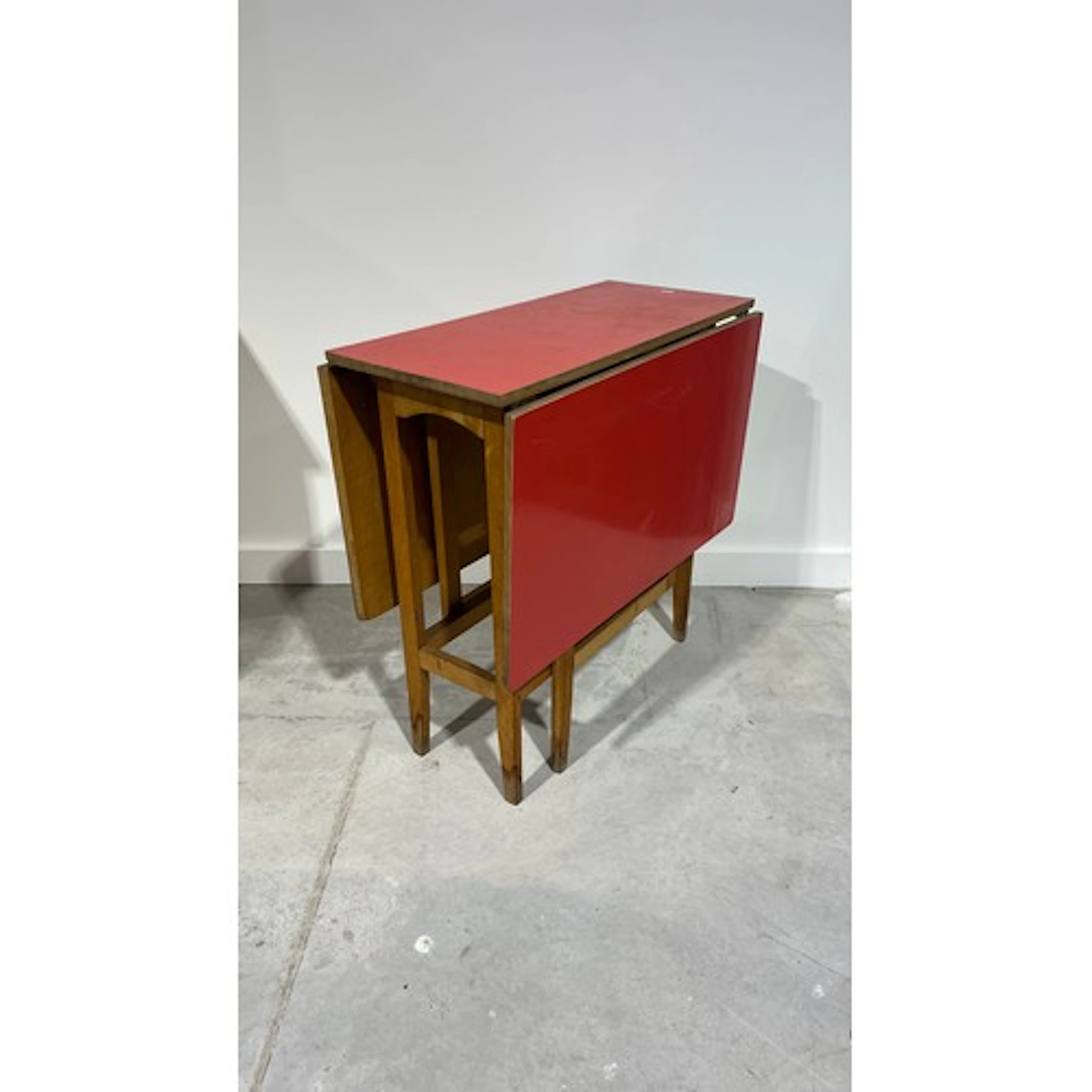 Red Formica top drop flap table, 75cm x 74cm, 118cm extended...