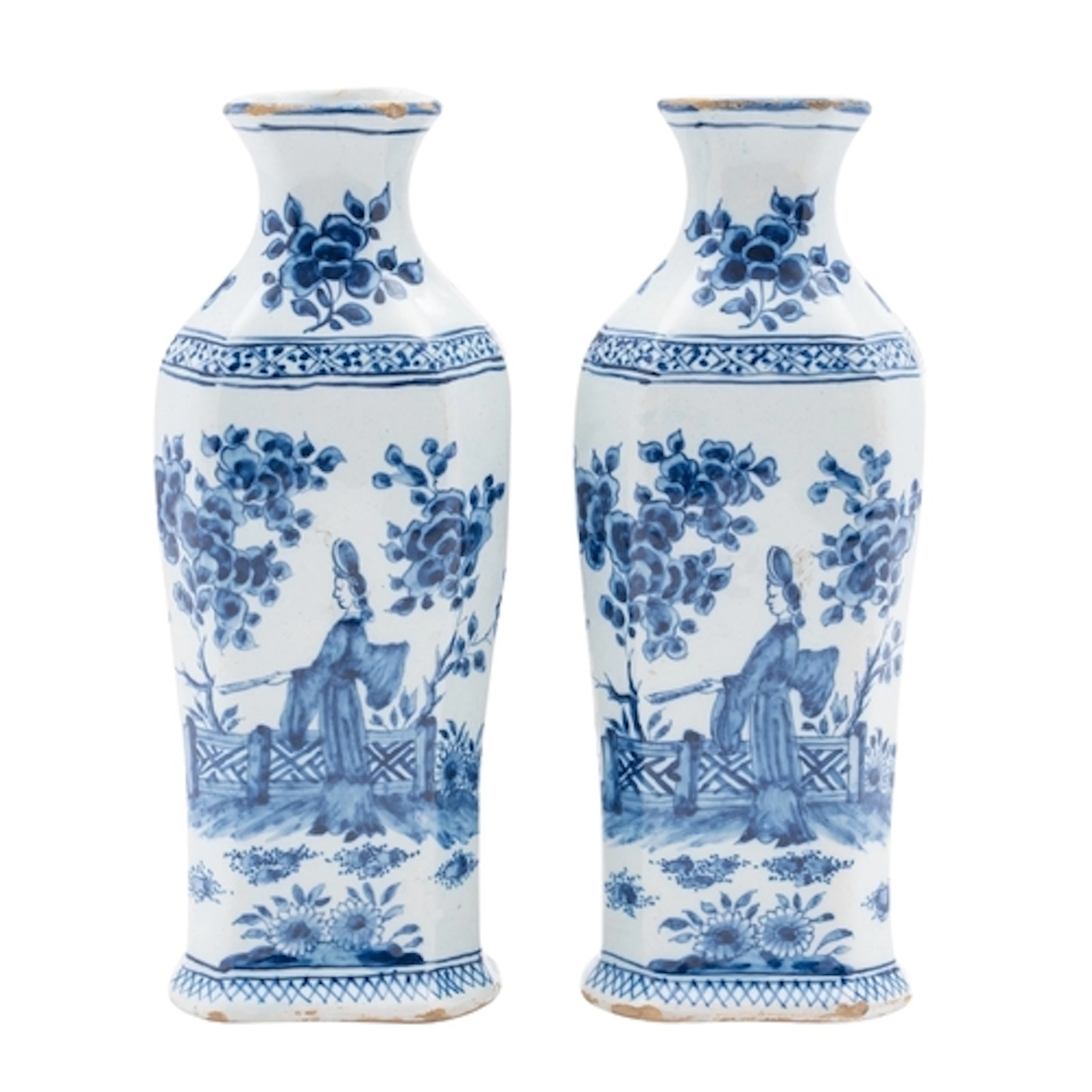 A pair of Dutch Delft pottery flasks of shouldered hexagonal...