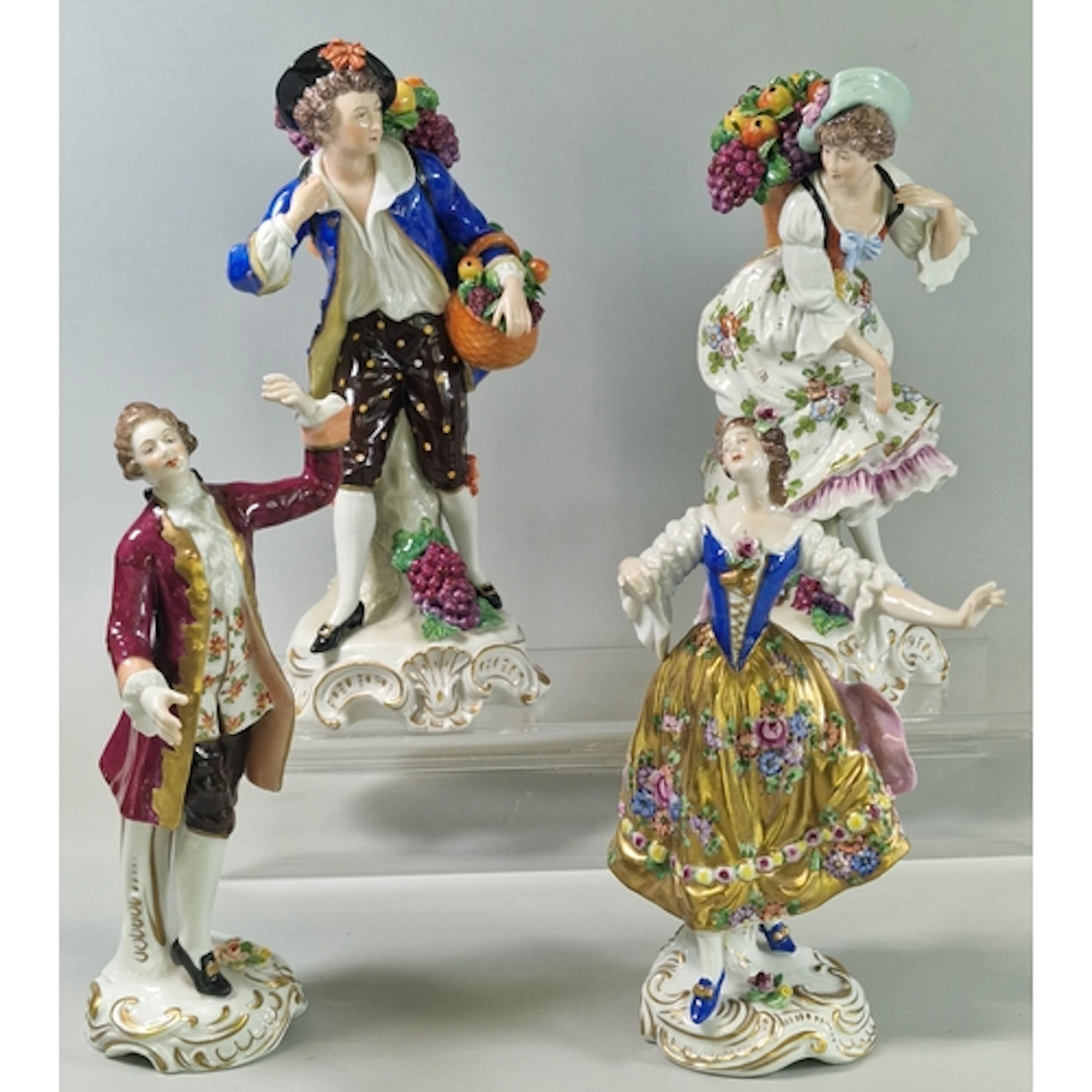 Two Volkstedt German porcelain figurines, together with two ...