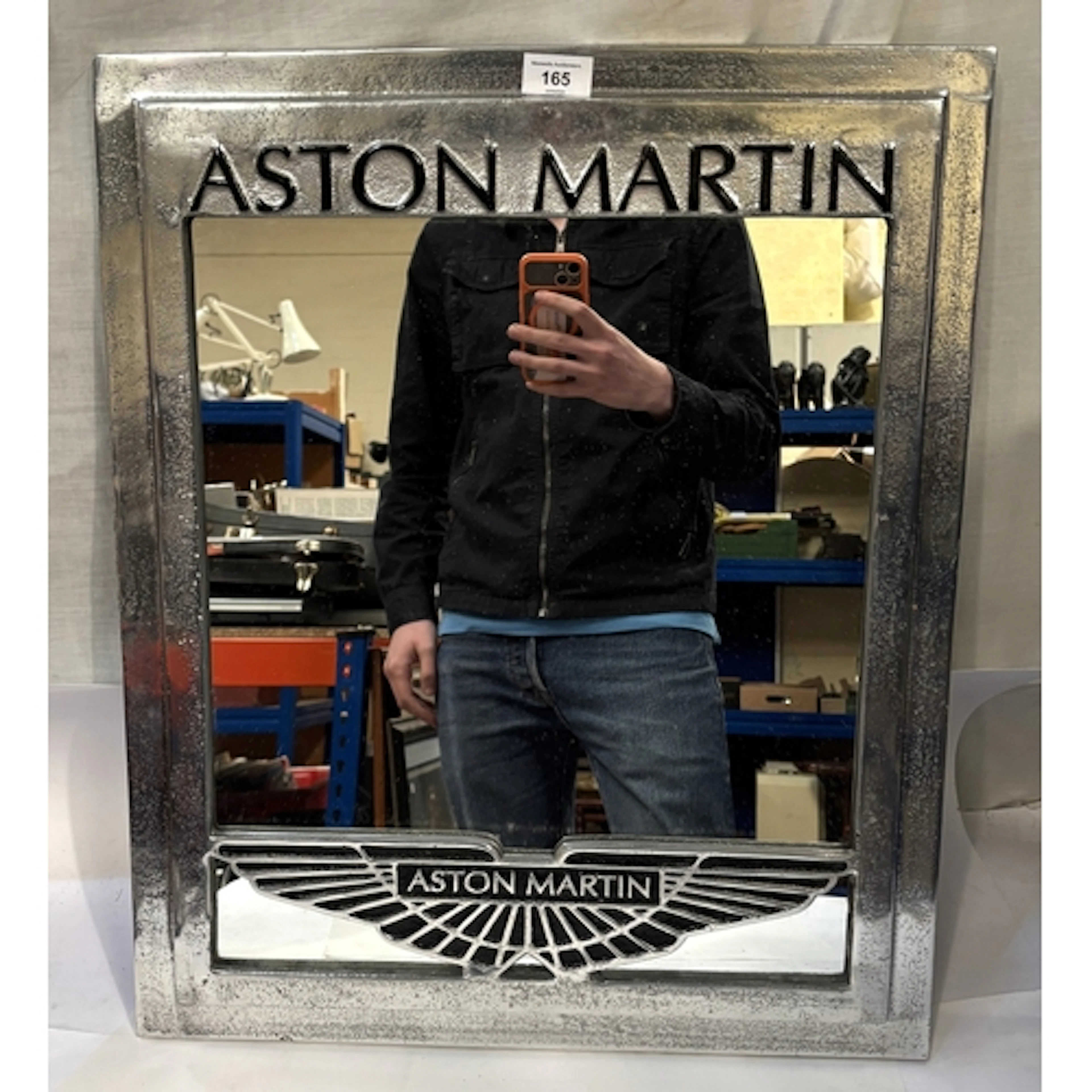 Aston Martin, metal work wall mirror.