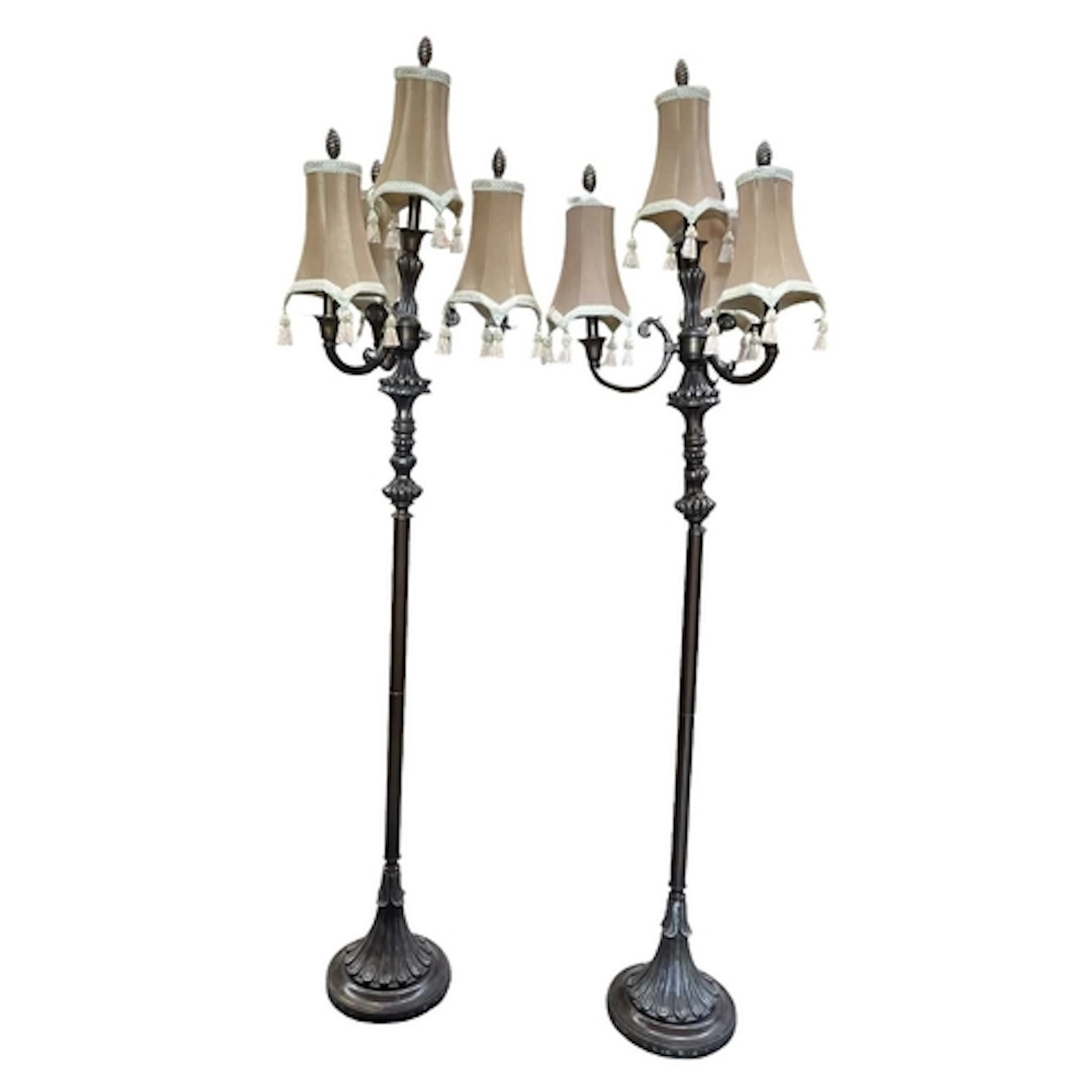 A pair of contemporary cast metal floor standard lamps. Each...