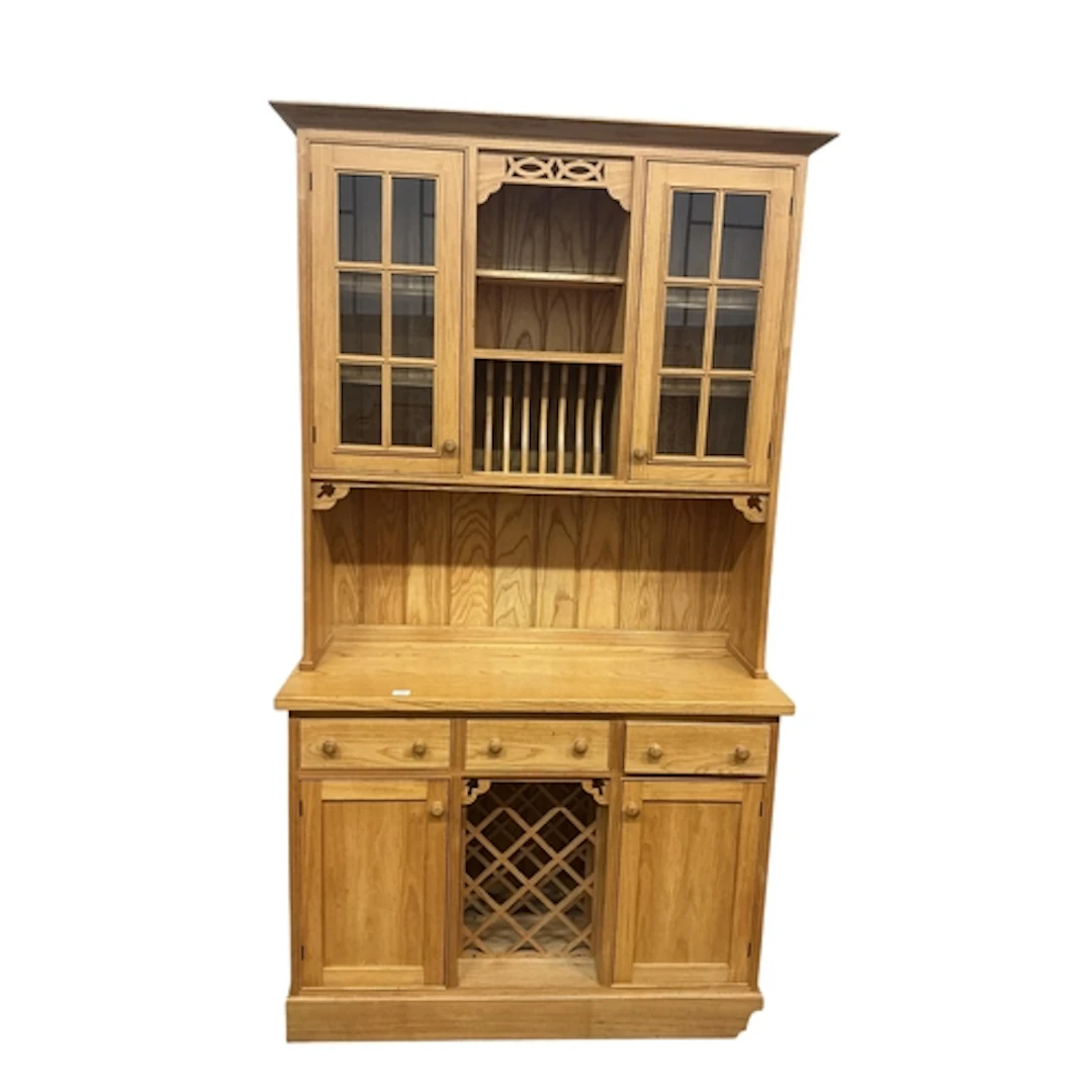 A modern light oak dresser, constructed from timber fallen d...