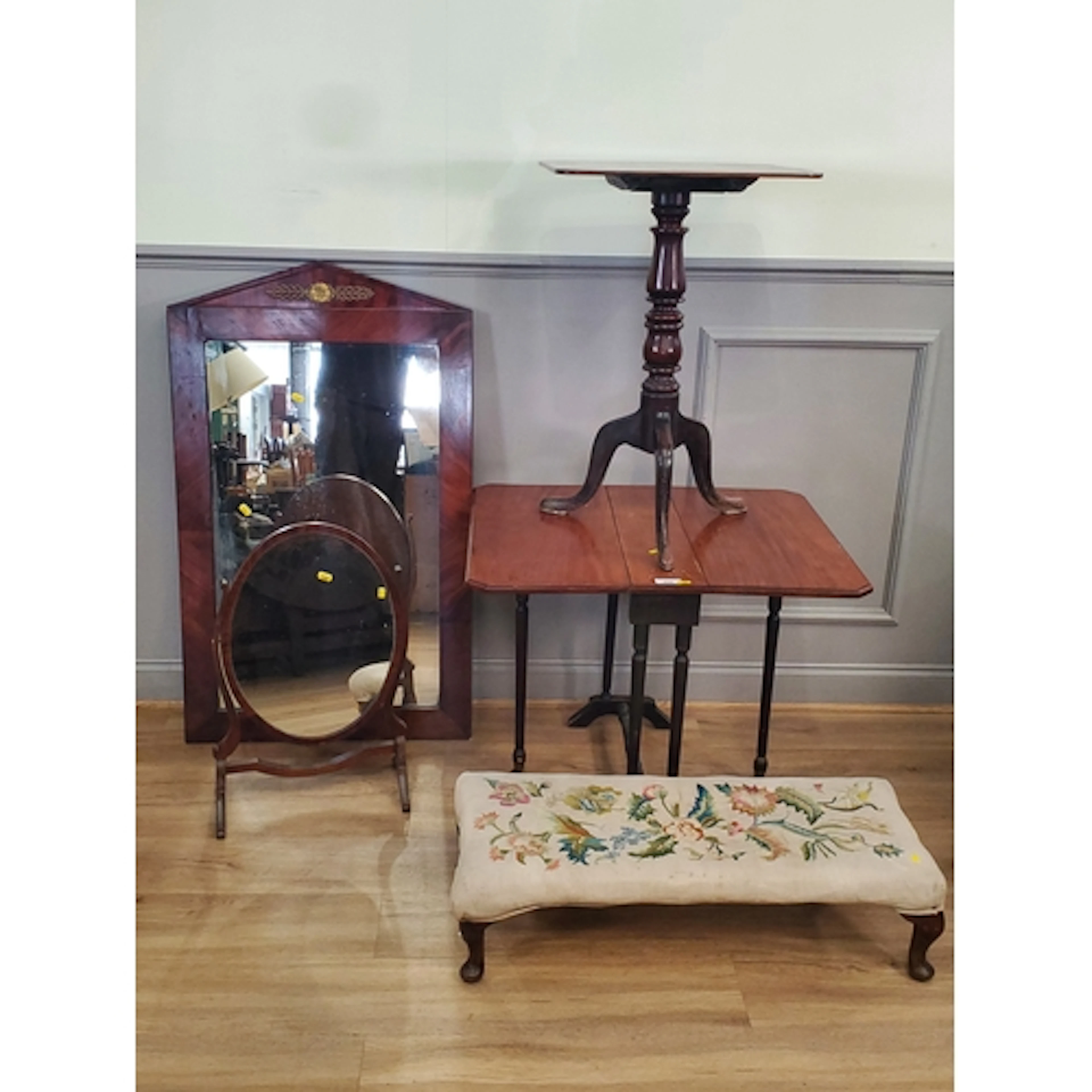 A mahogany Sutherland Table, Dressing Mirror, Footstool, sid...