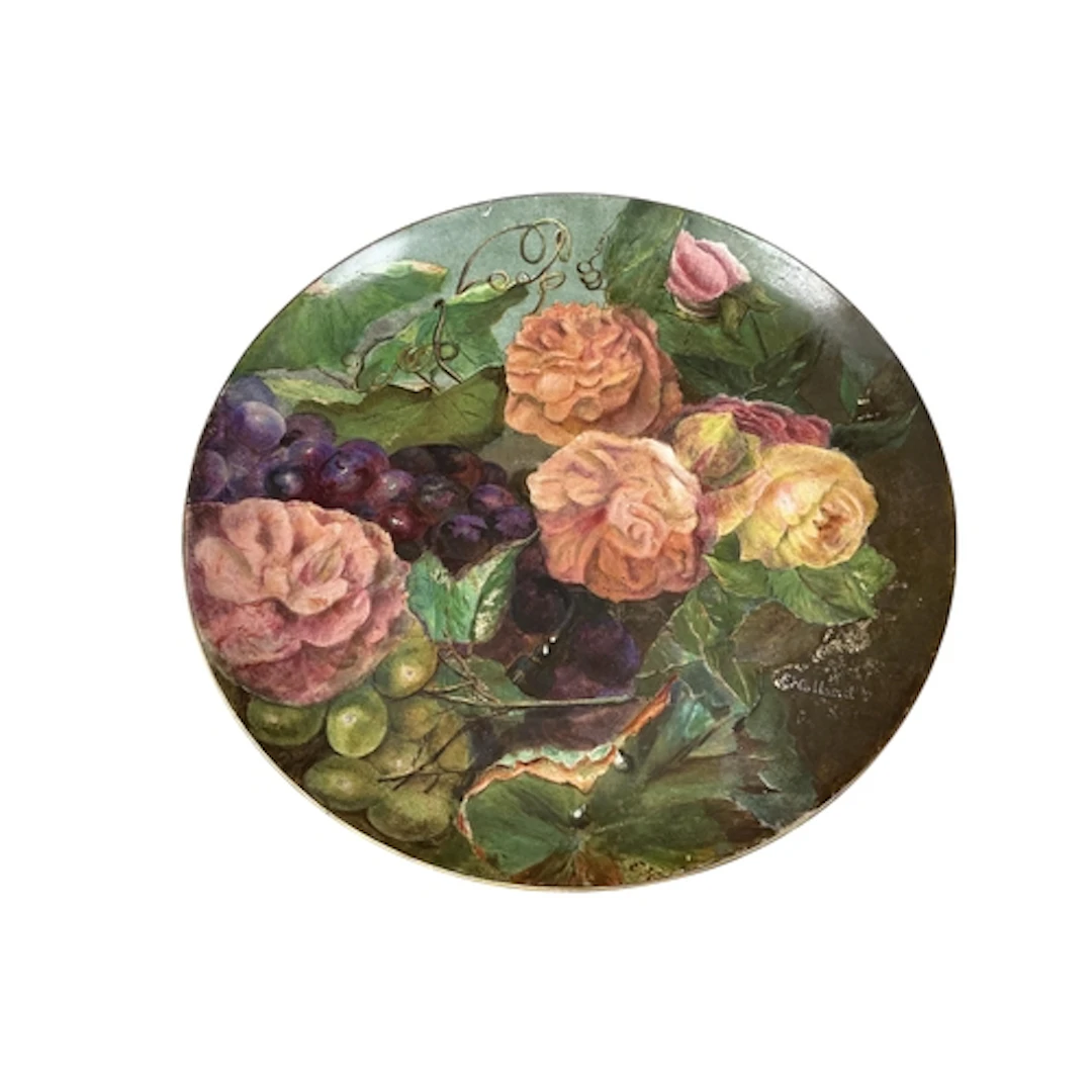 A Howell and James charger, handpainted with fruit and roses...
