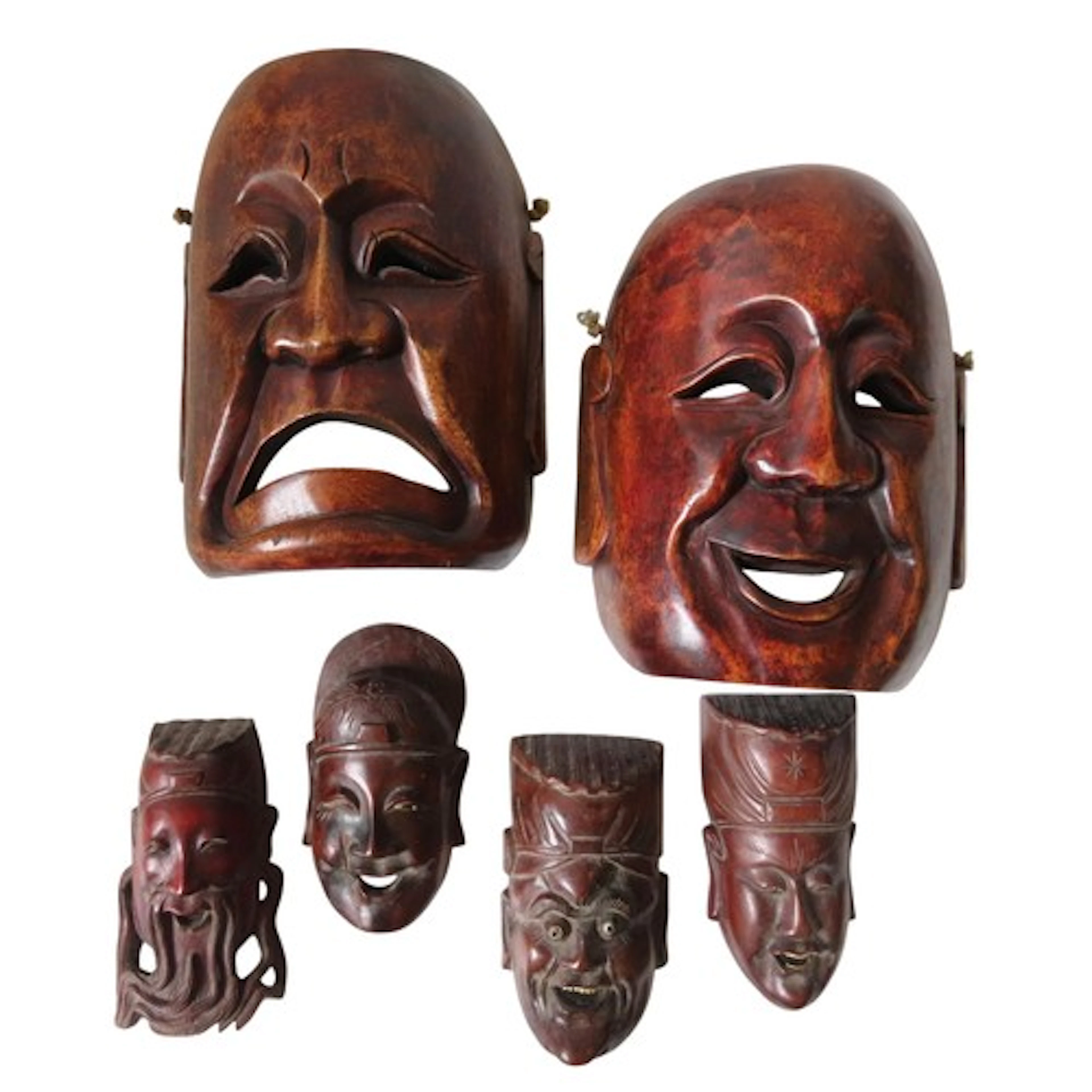 TWO CARVED WOODEN JAPANESE THEATRICAL MASKS together with fo...