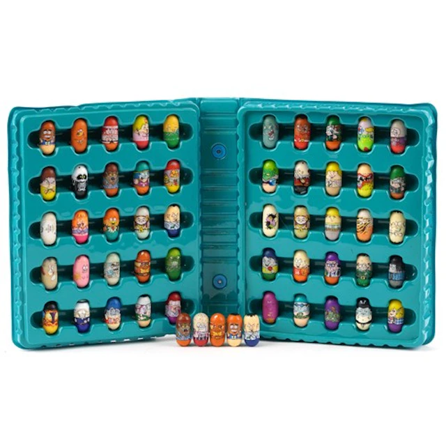 A collection of vintage Mighty Beanz toys housed in a fitted...