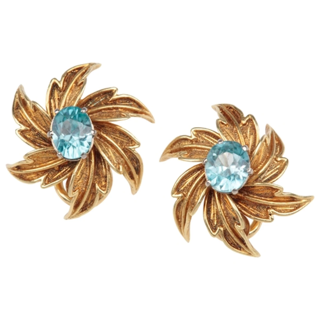 Cropp & Farr, a pair of gold and zircon ear clips, circa 197...