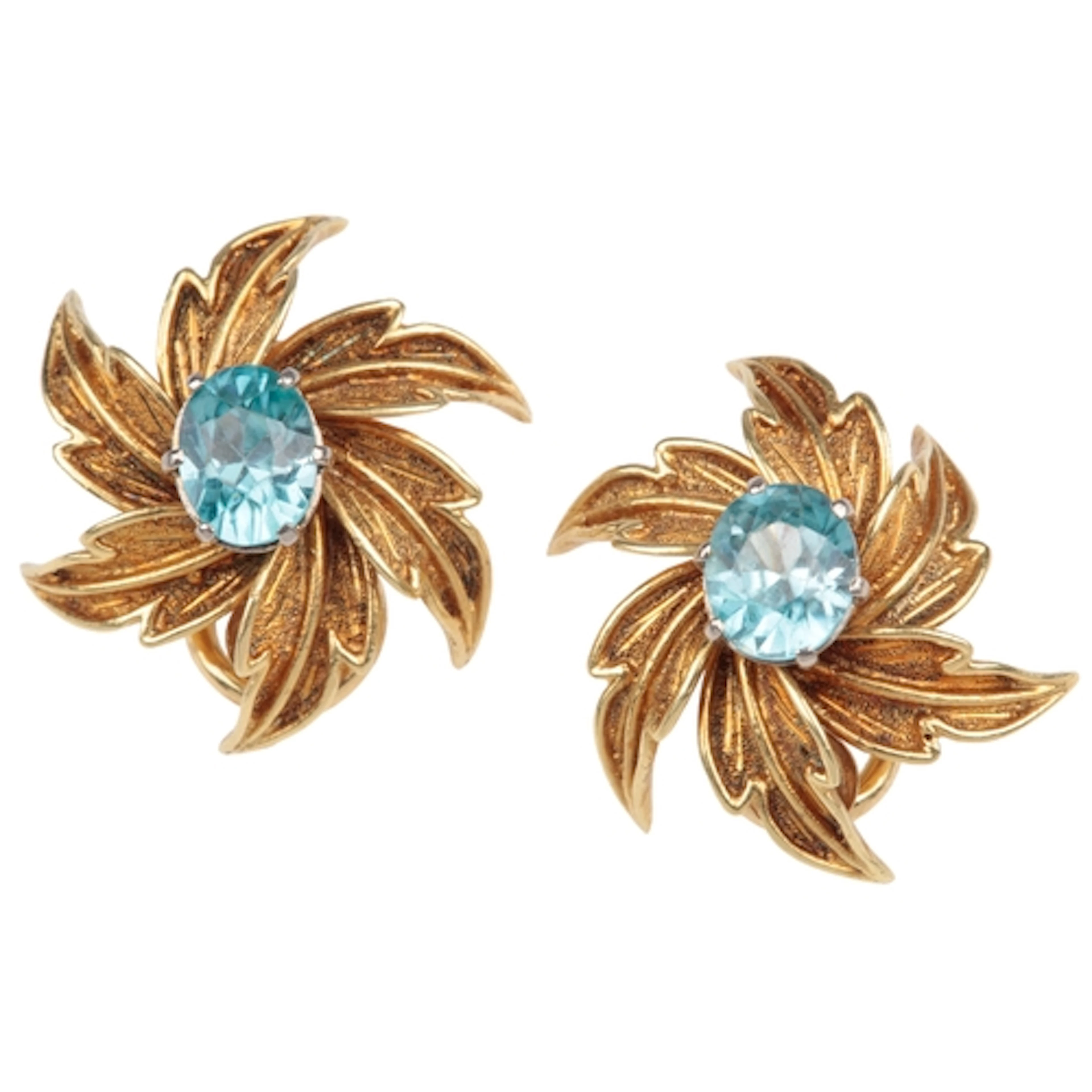 Cropp & Farr, a pair of gold and zircon ear clips, circa 197...