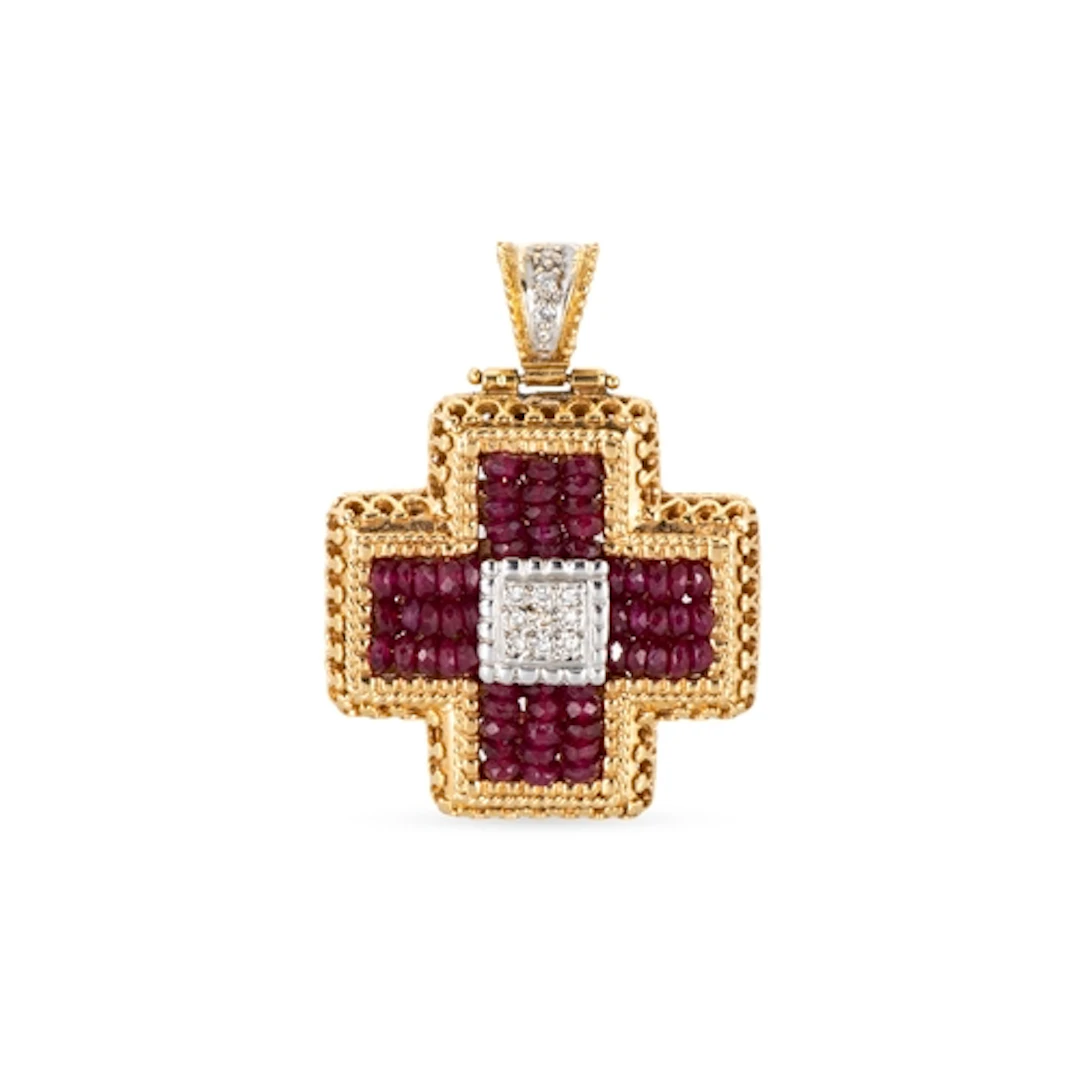 A RUBY AND DIAMOND SET CROSS PENDANT, the beaded rubies arra...