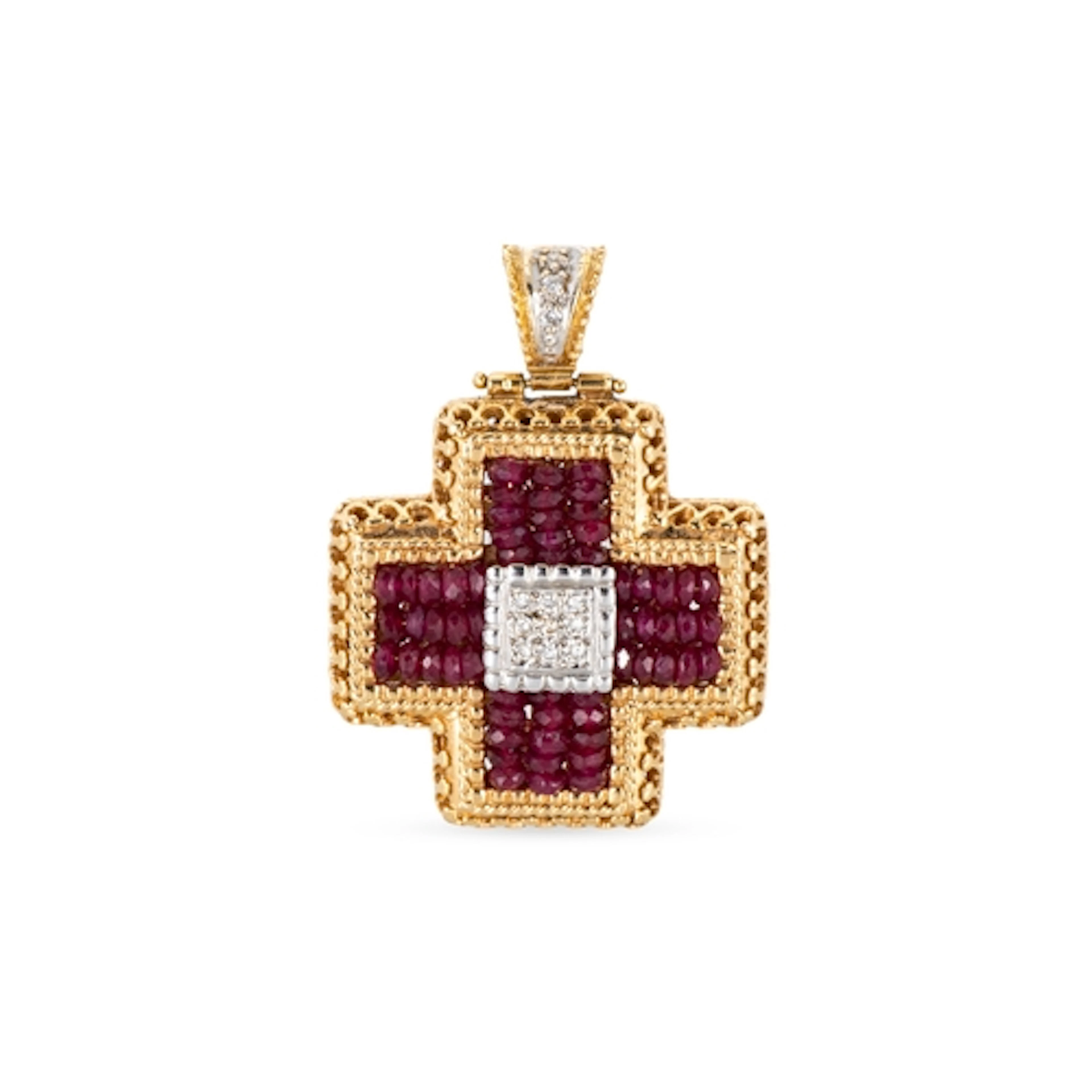 A RUBY AND DIAMOND SET CROSS PENDANT, the beaded rubies arra...