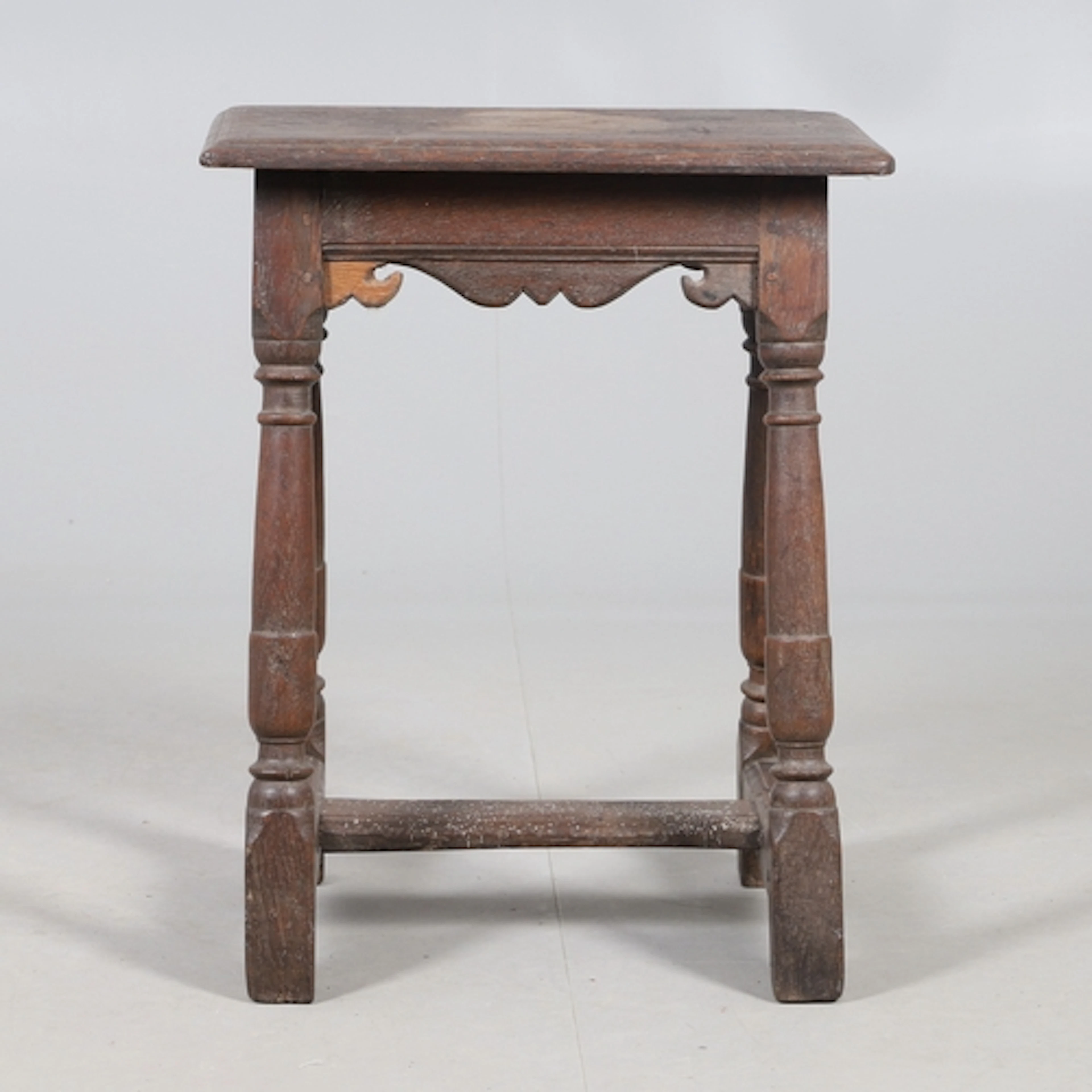 A RARE 17TH CENTURY OAK & ELM JOINT STOOL. of four peg const...