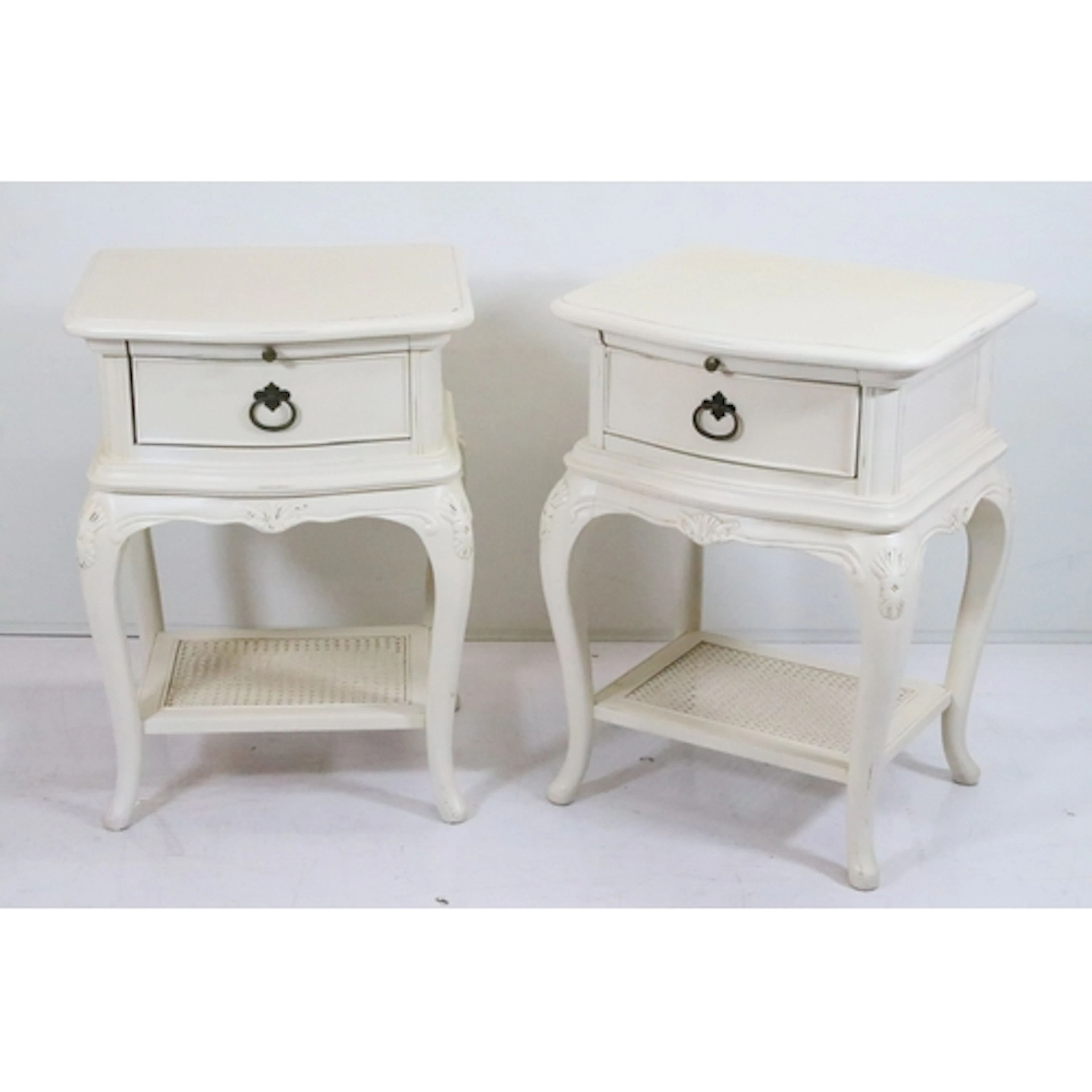 Pair of contemporary white painted bedside tables, having br...