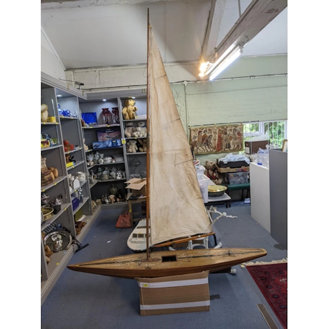 A Carnival pond yacht from 1930s with a weighted keel and li...