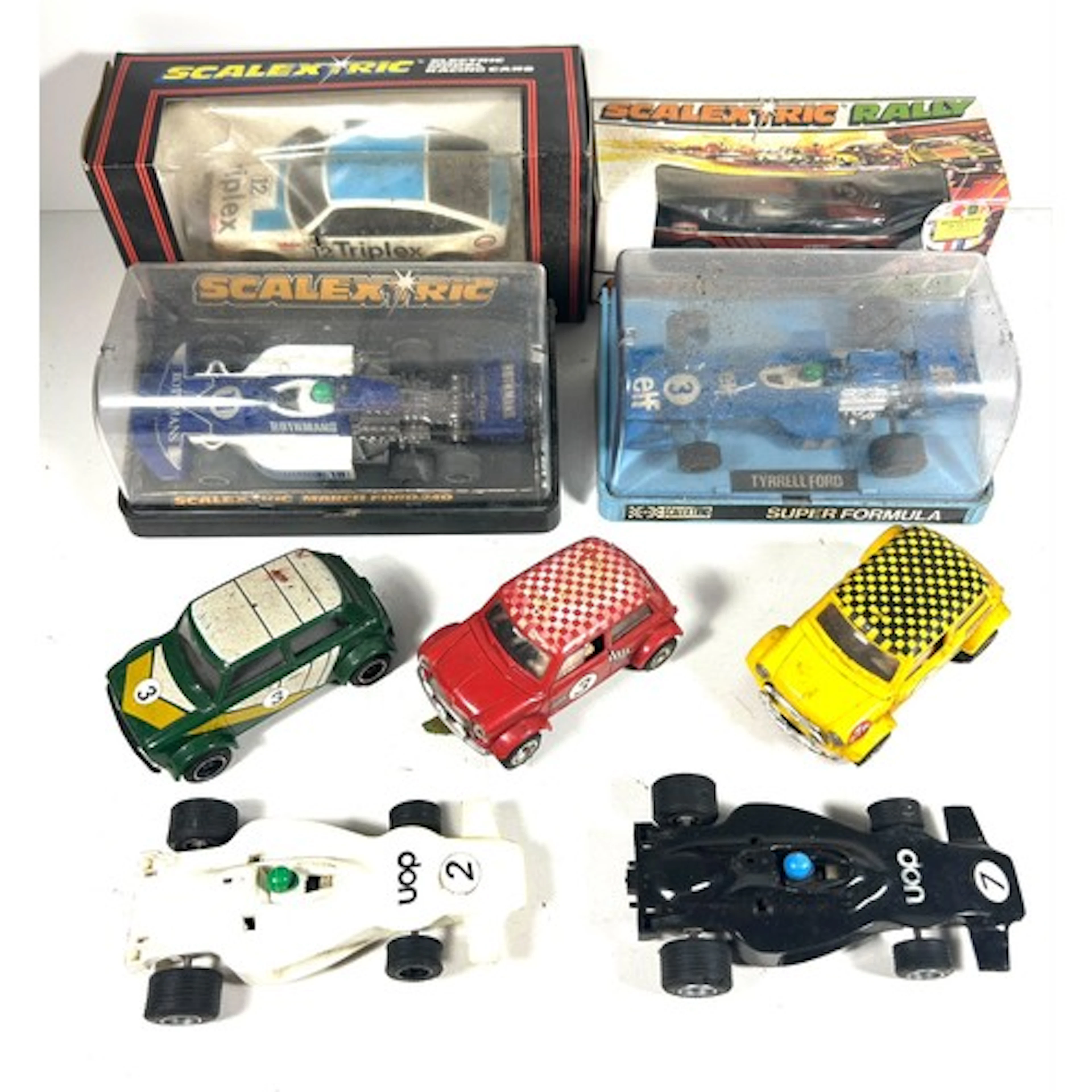 SCALEXTRIC. 11 boxed Scalextric cars from 1970s /1980s. Incl...