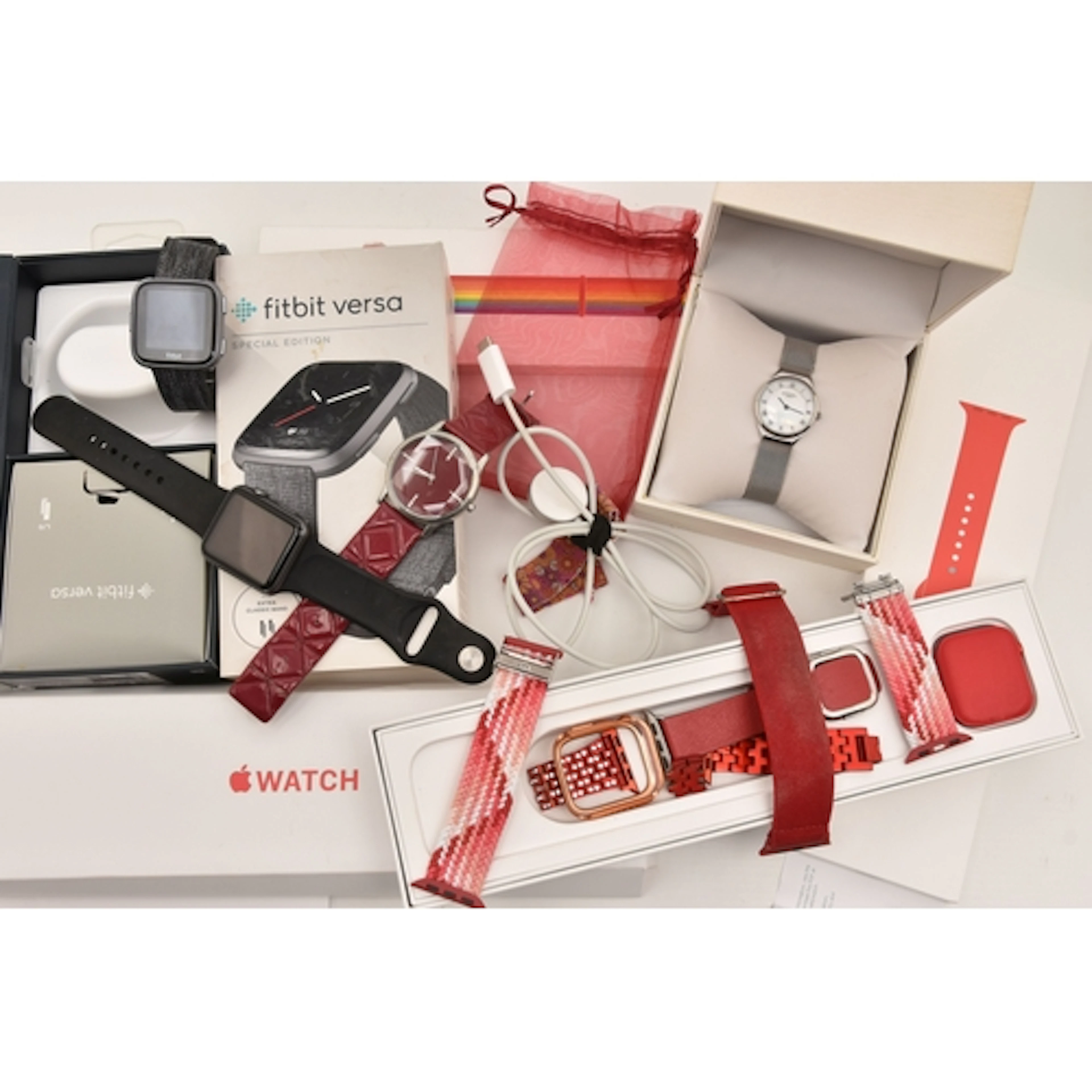 AN ASSORTMENT OF WATCHES, to include a boxed Apple series 6 ...