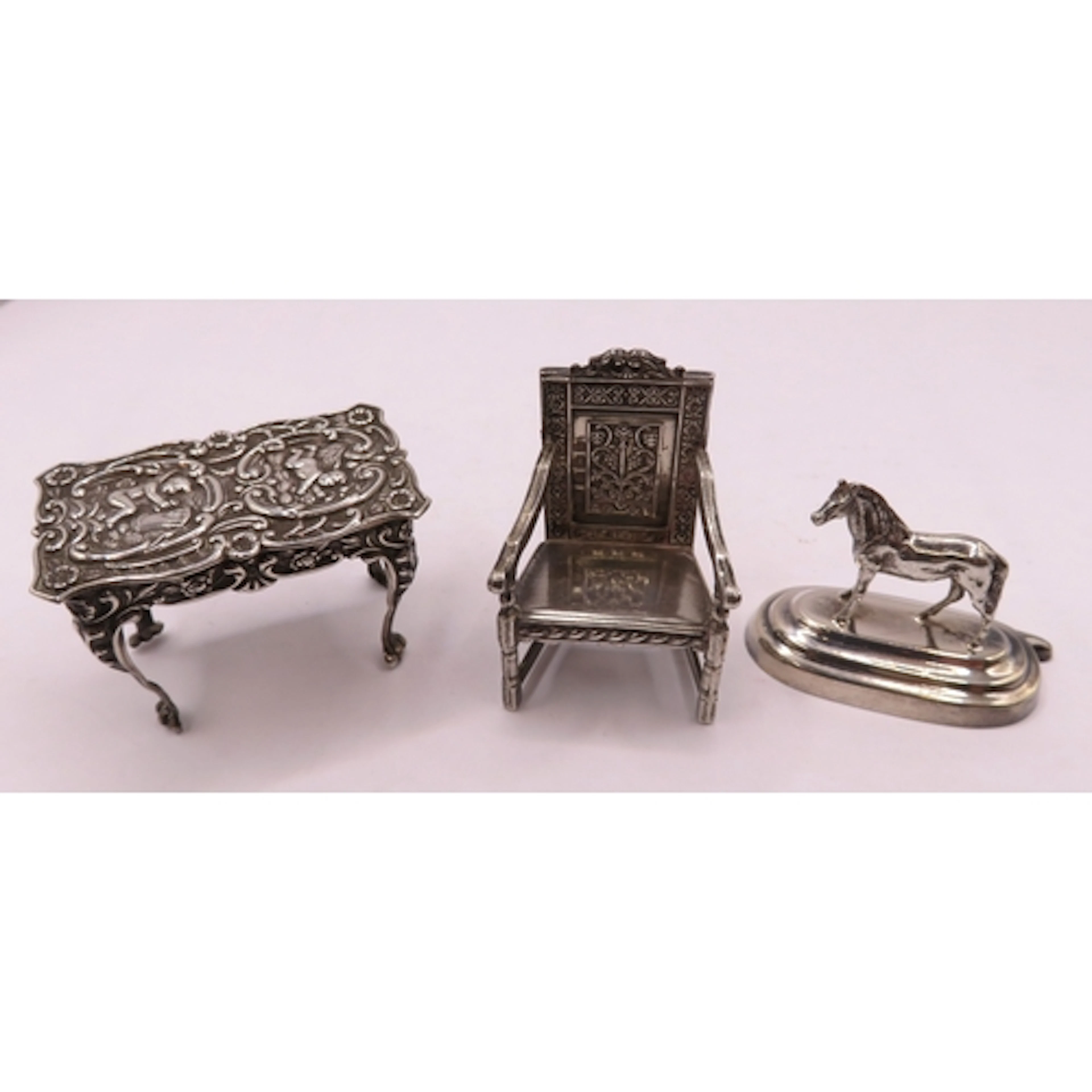Birmingham embossed silver miniature table together with a m...