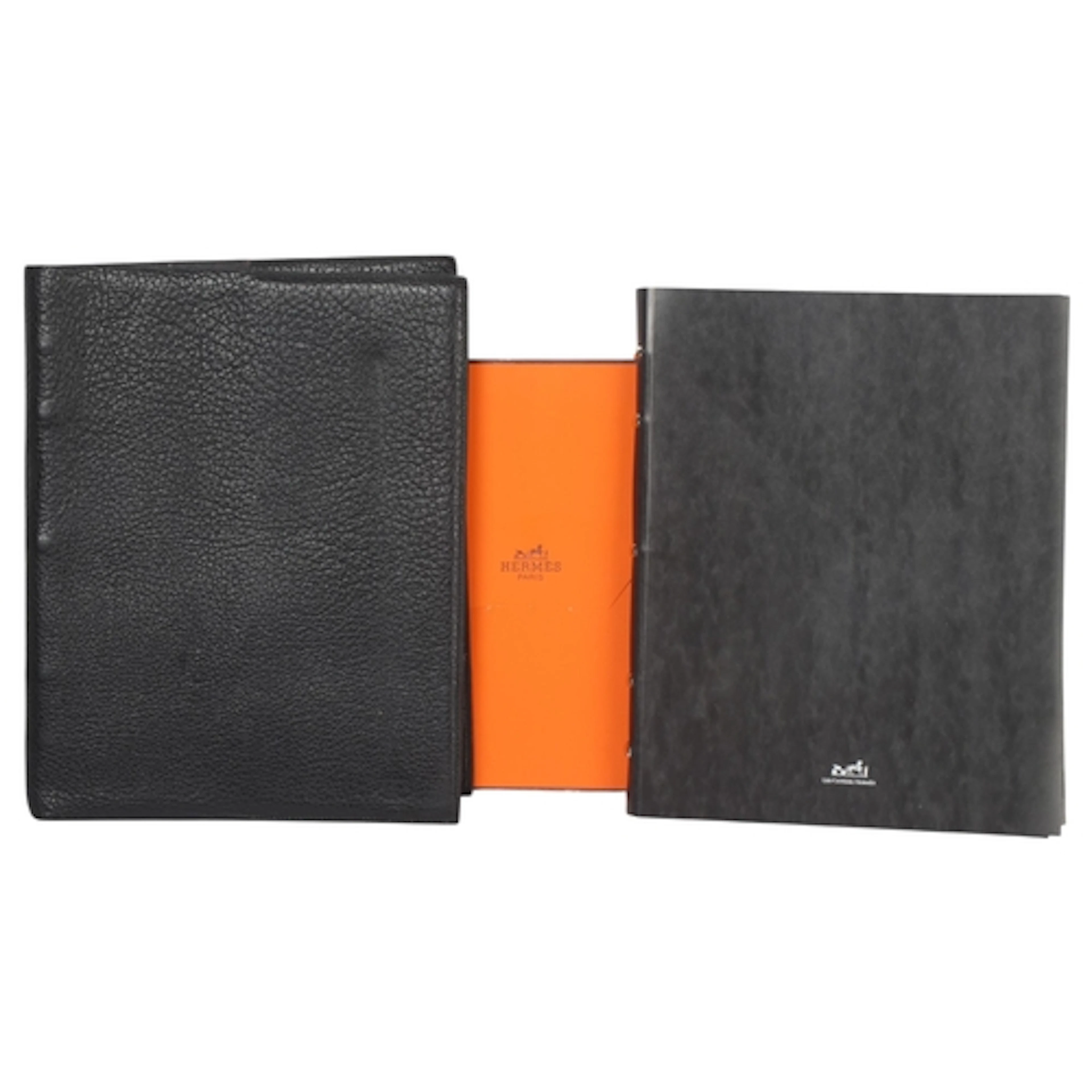 A Hermes soft black leather notebook cover and lined noteboo...
