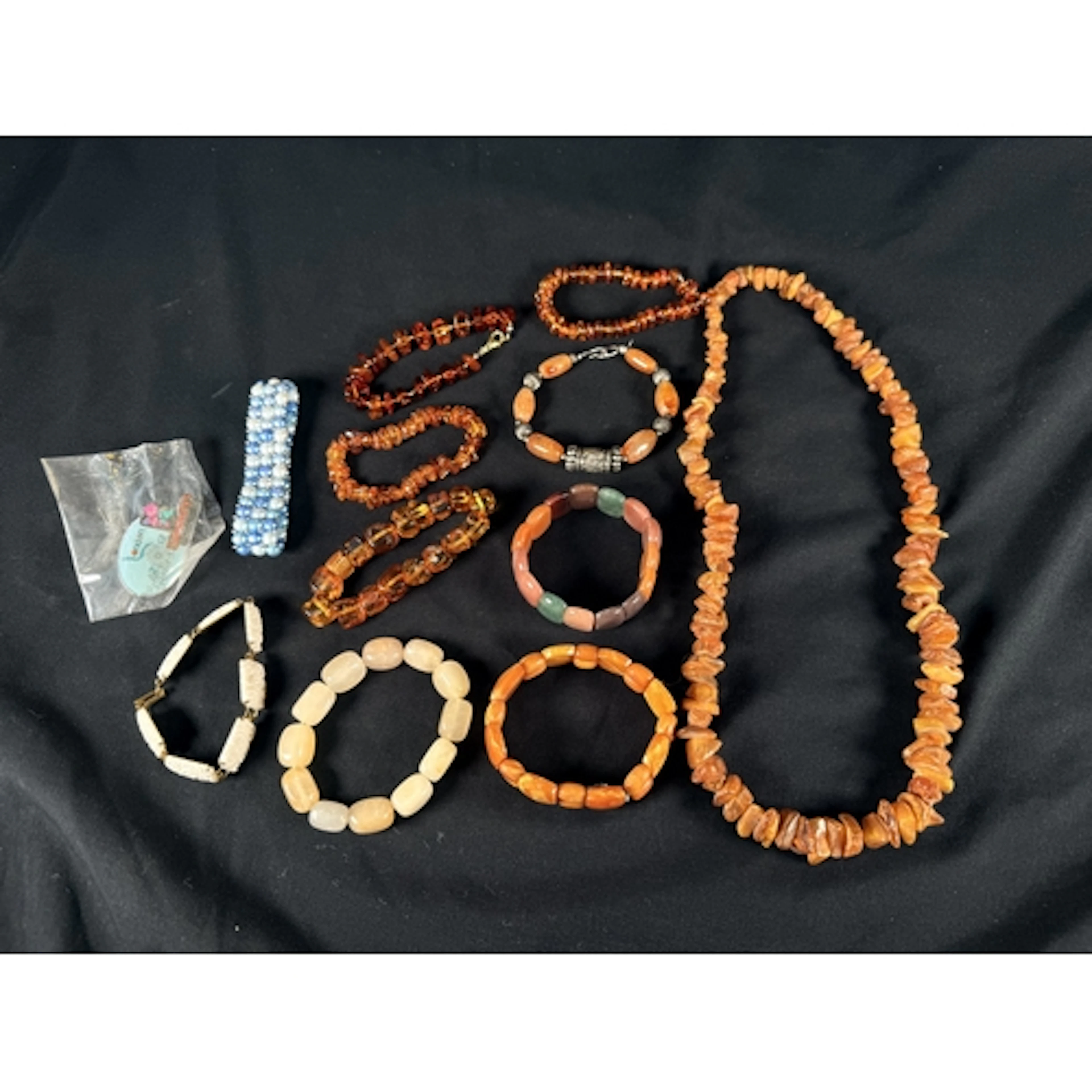 A string of reconstituted amber chips; a selection of amber ...