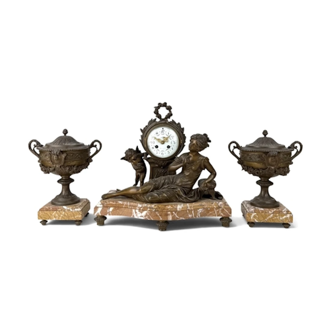 A FRENCH LATE 19TH CENTURY MARBLE AND GILT METAL CLOCK GARNI...