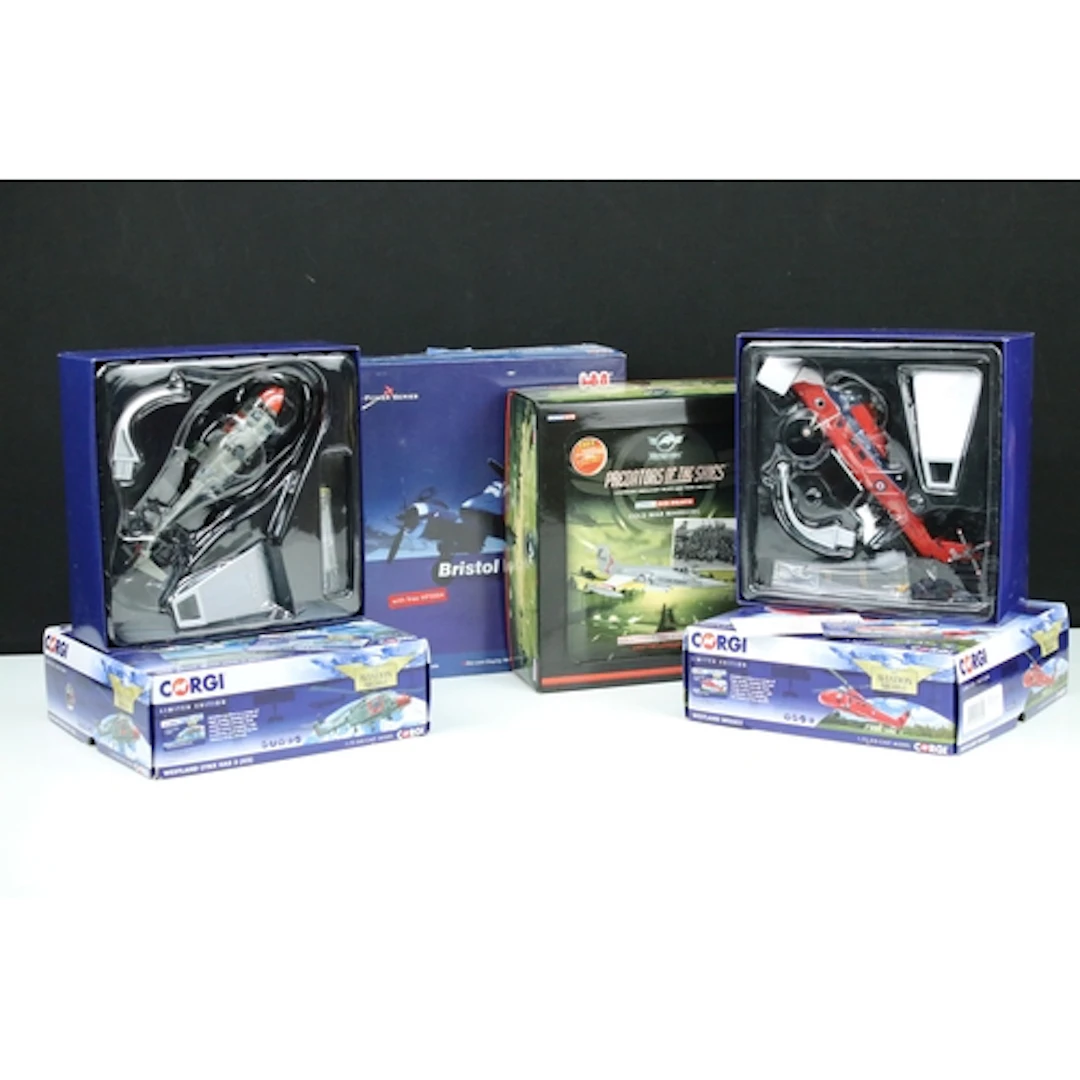 Four boxed diecast model aircraft to include 2 x ltd edn Cor...