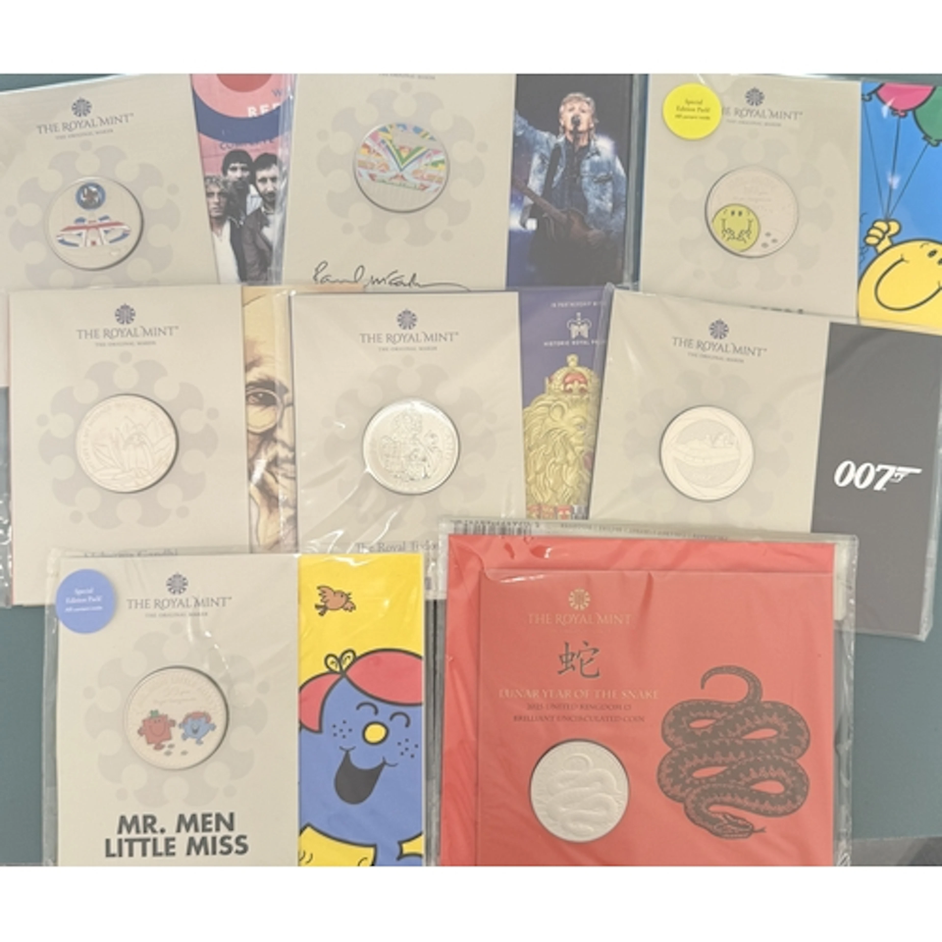 A collection of fifty-two UK Queen Elizabeth II and King Cha...