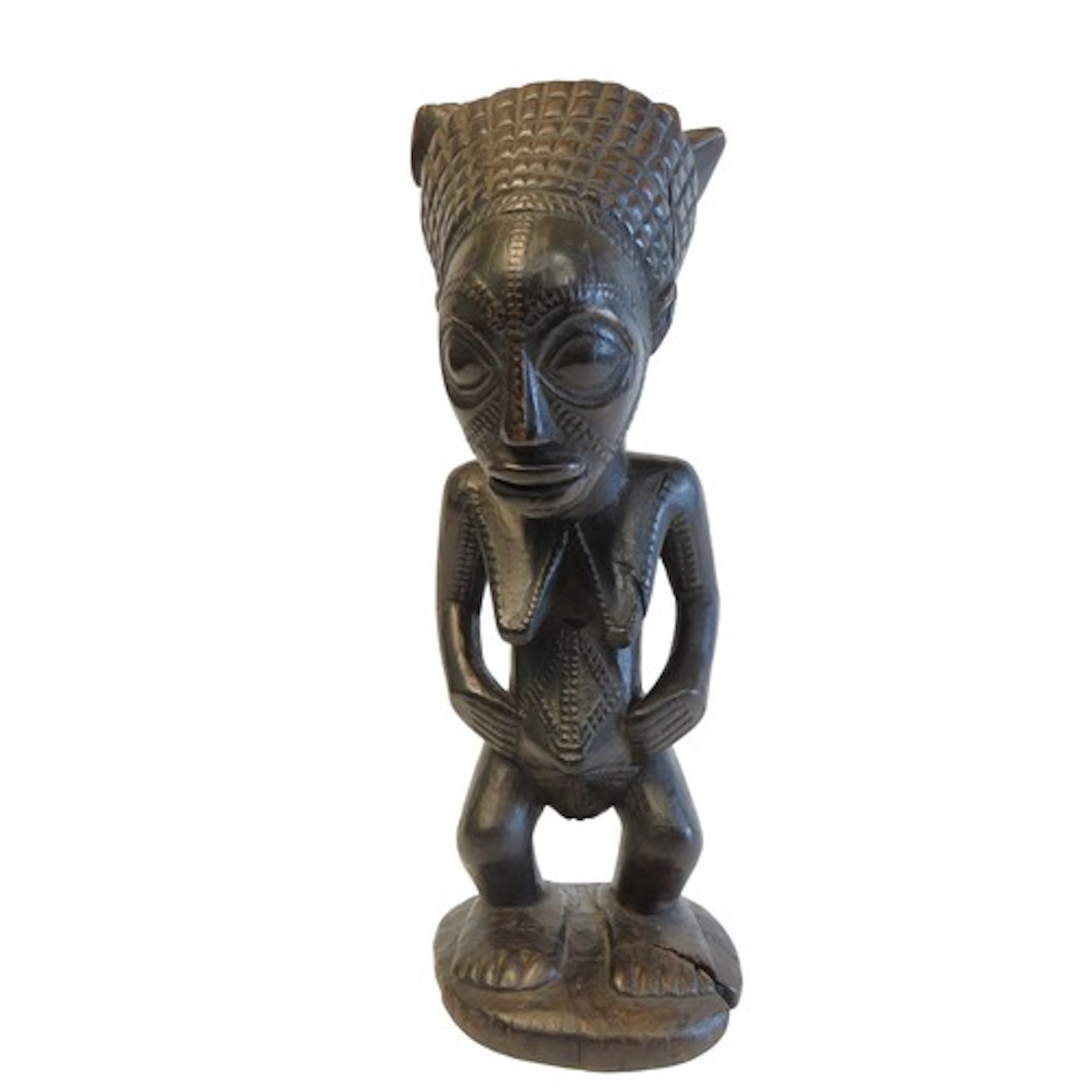 A HEMBA FEMALE 'ANCESTOR' FIGURE the body decorated with rep...