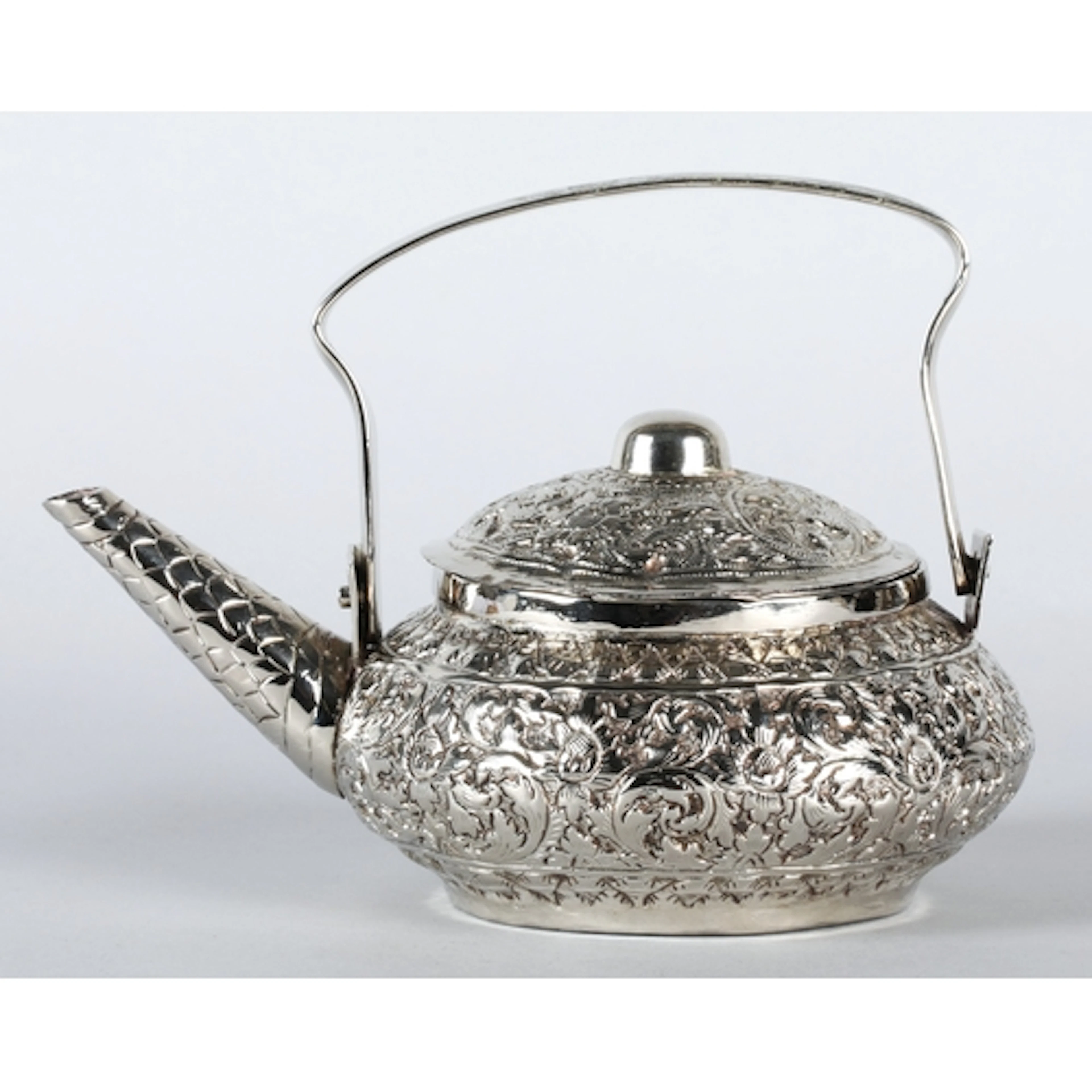 South East Asian silver coloured Thai style tea pot with cov...