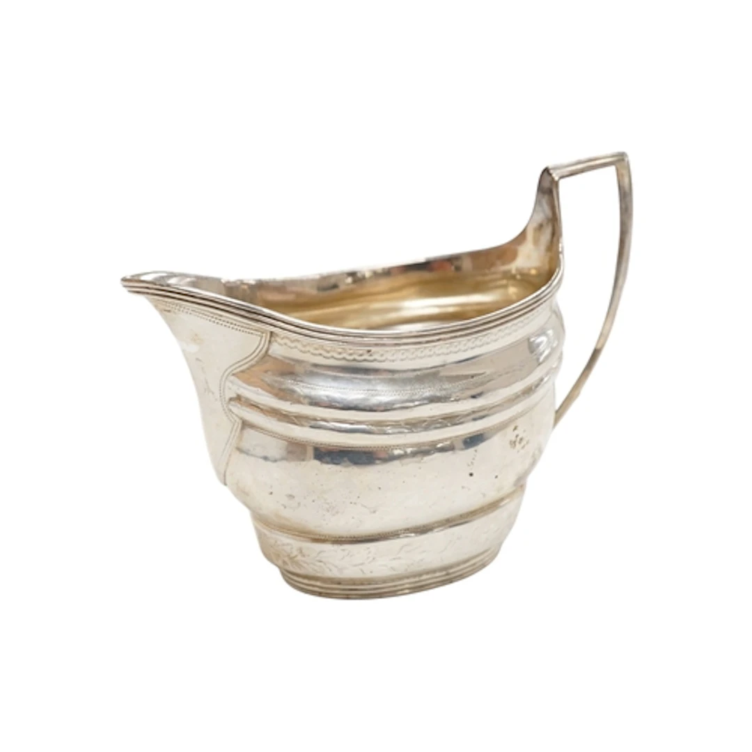 A George III silver cream jug, maker's mark rubbed, London ,...