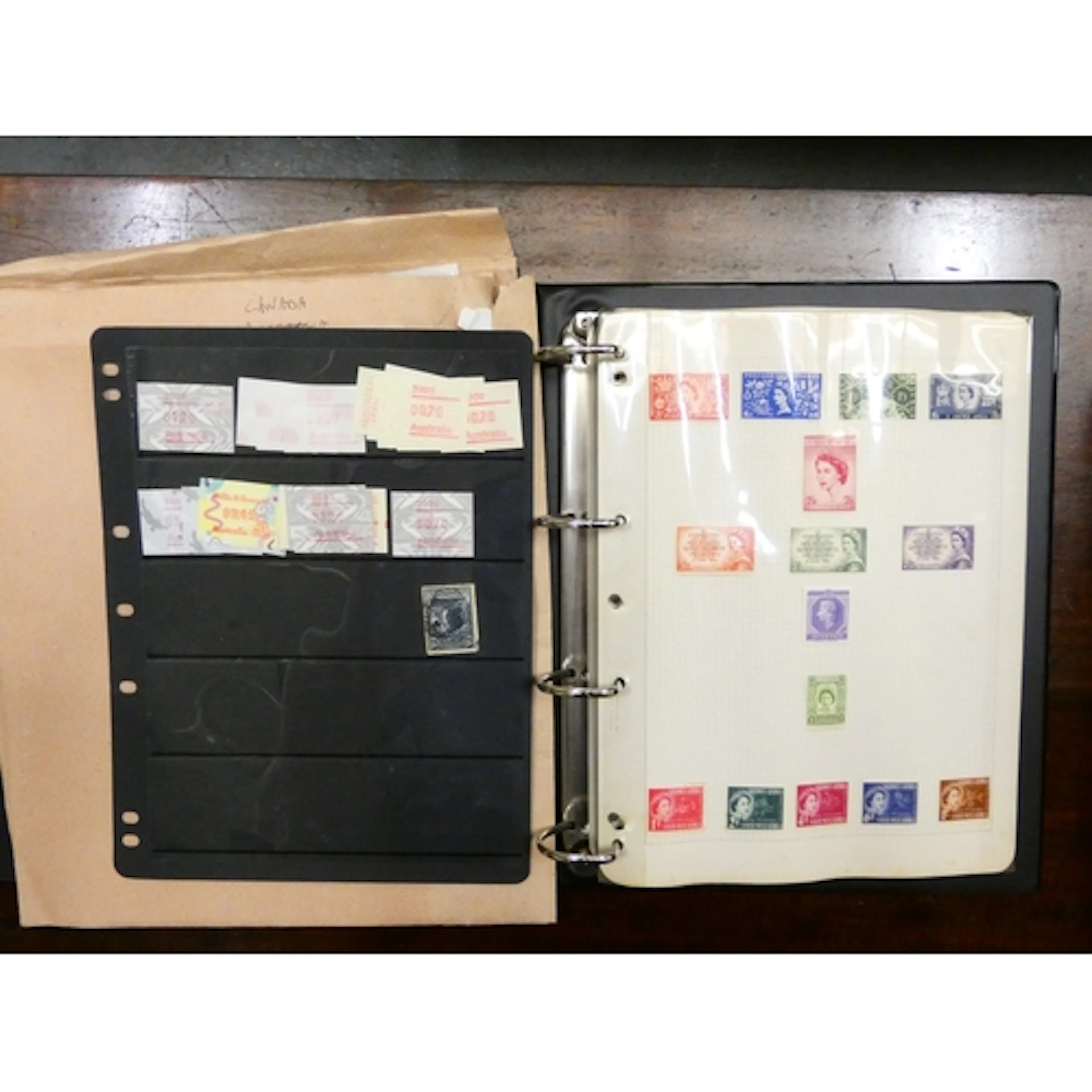 Vintage stamp album containing world stamps.