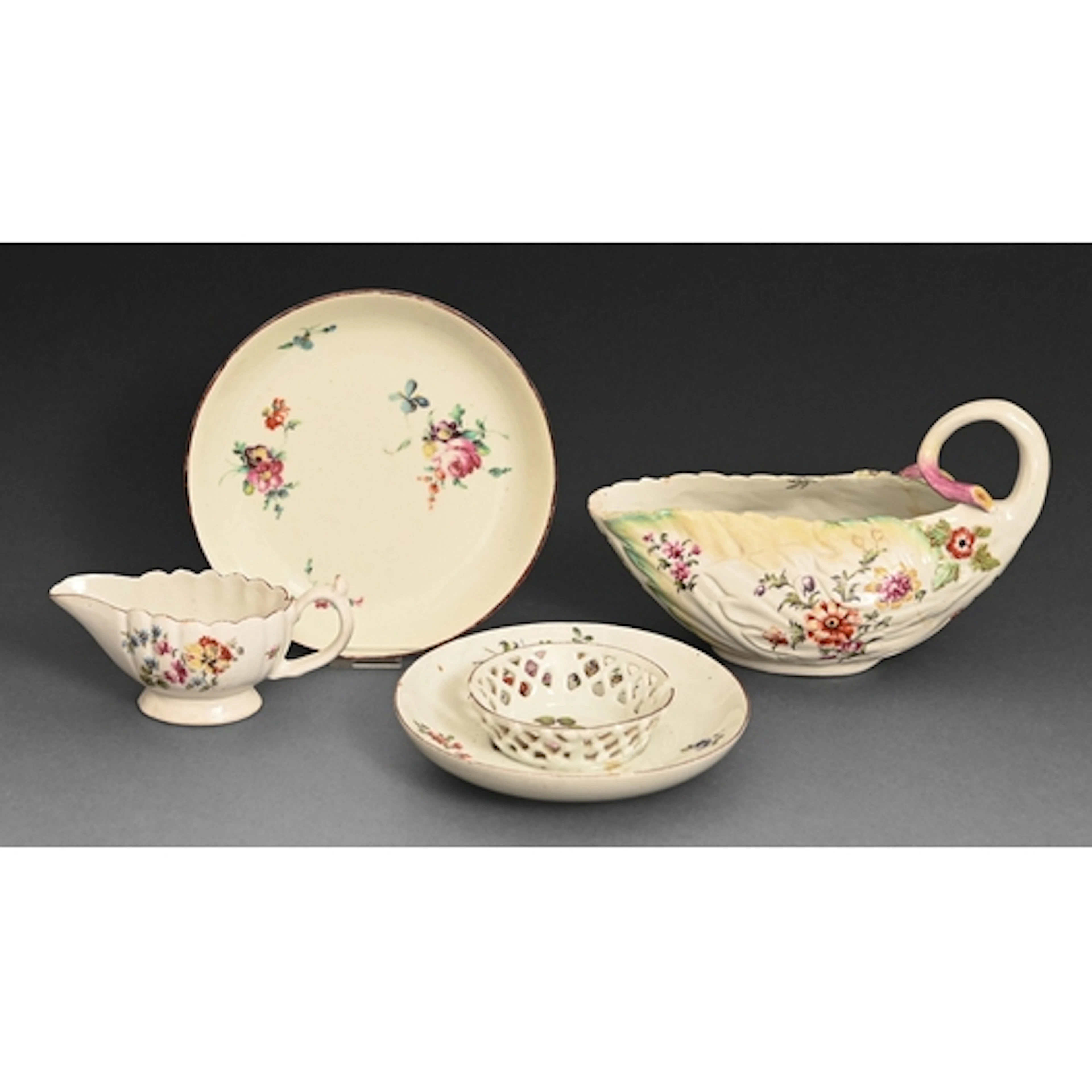 A Derby cos lettuce sauceboat, 1760-1765, painted with flowe...