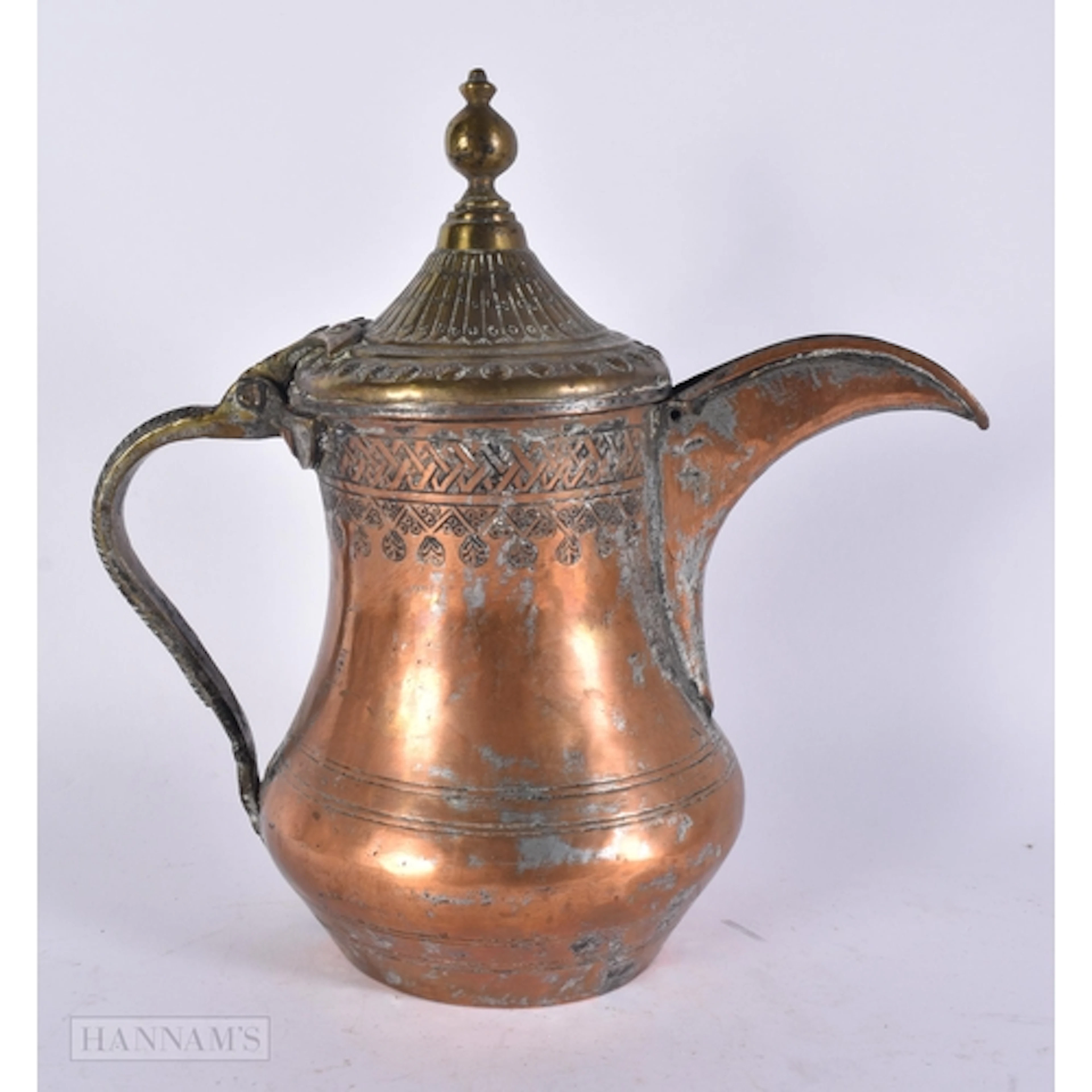 AN ANTIQUE MIDDLE EASTERN EWER. 28 cm x 22 cm.