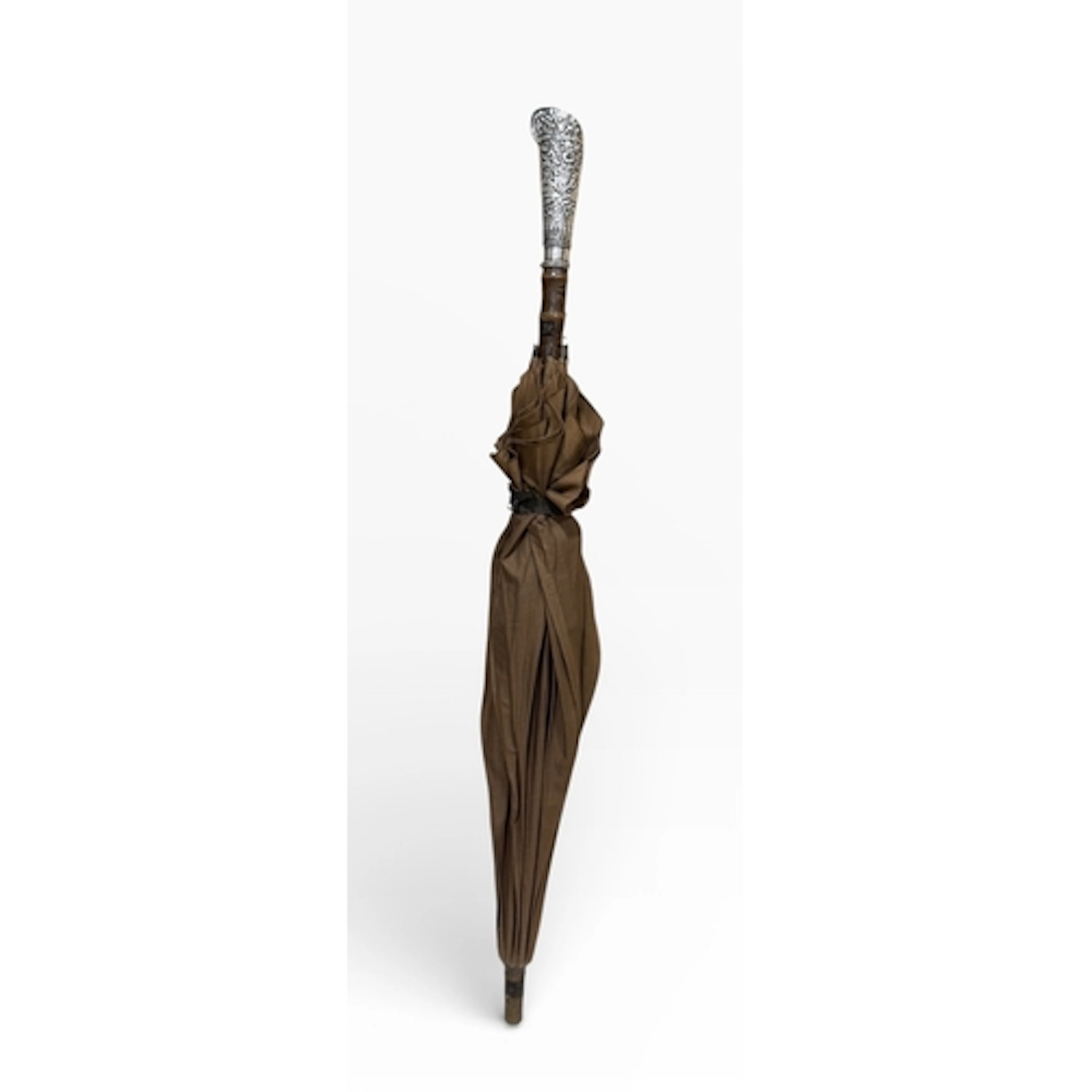 A SILVER HANDLED AND FAUX BAMBOO UMBRELLA The silver likely ...