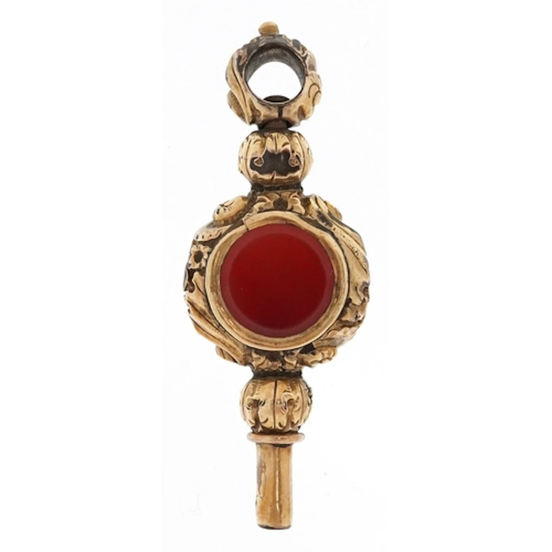 Antique yellow metal carnelian watch key, 4.7cm high, 8.5g.