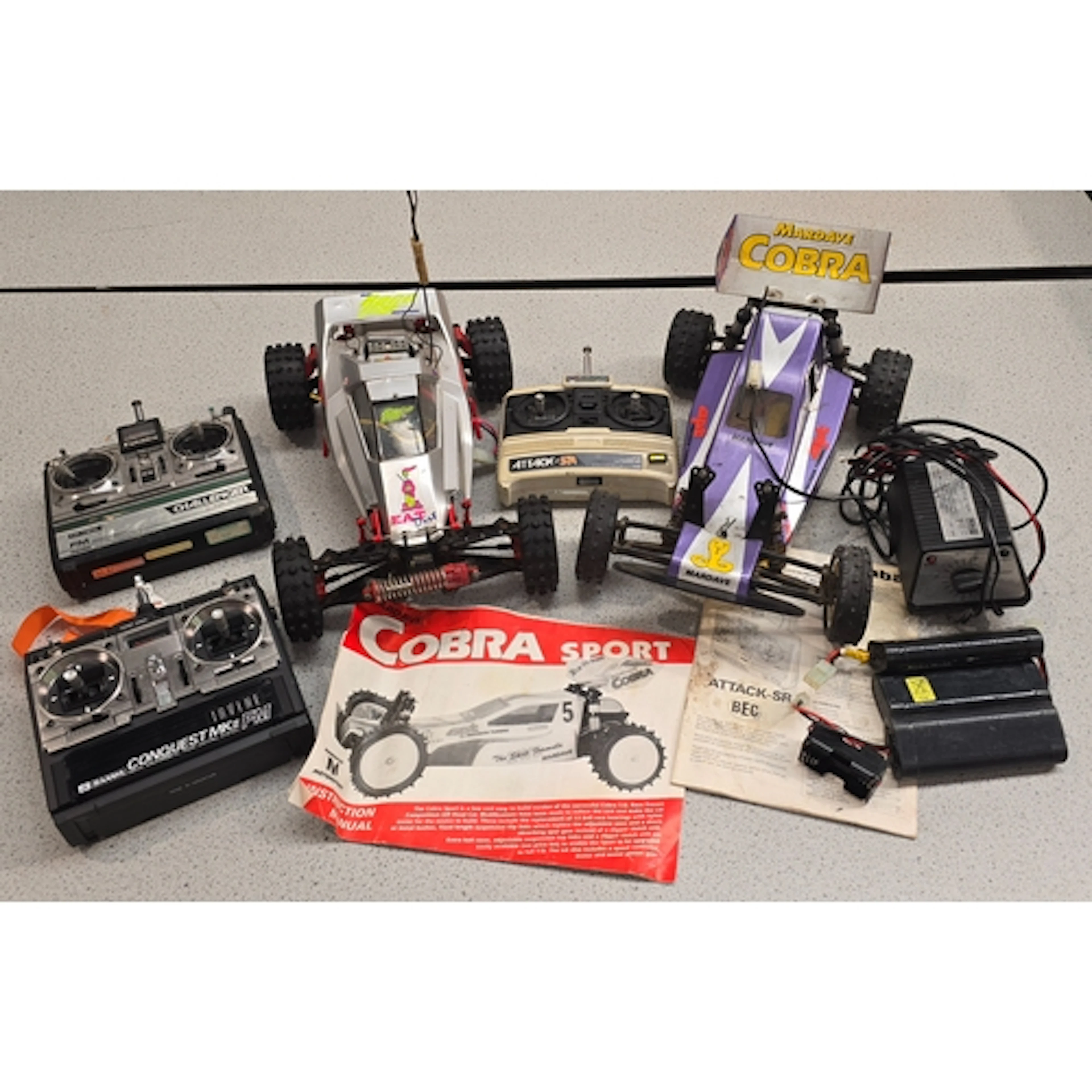 A Tamiya vintage radio controlled car together with a Mardav...