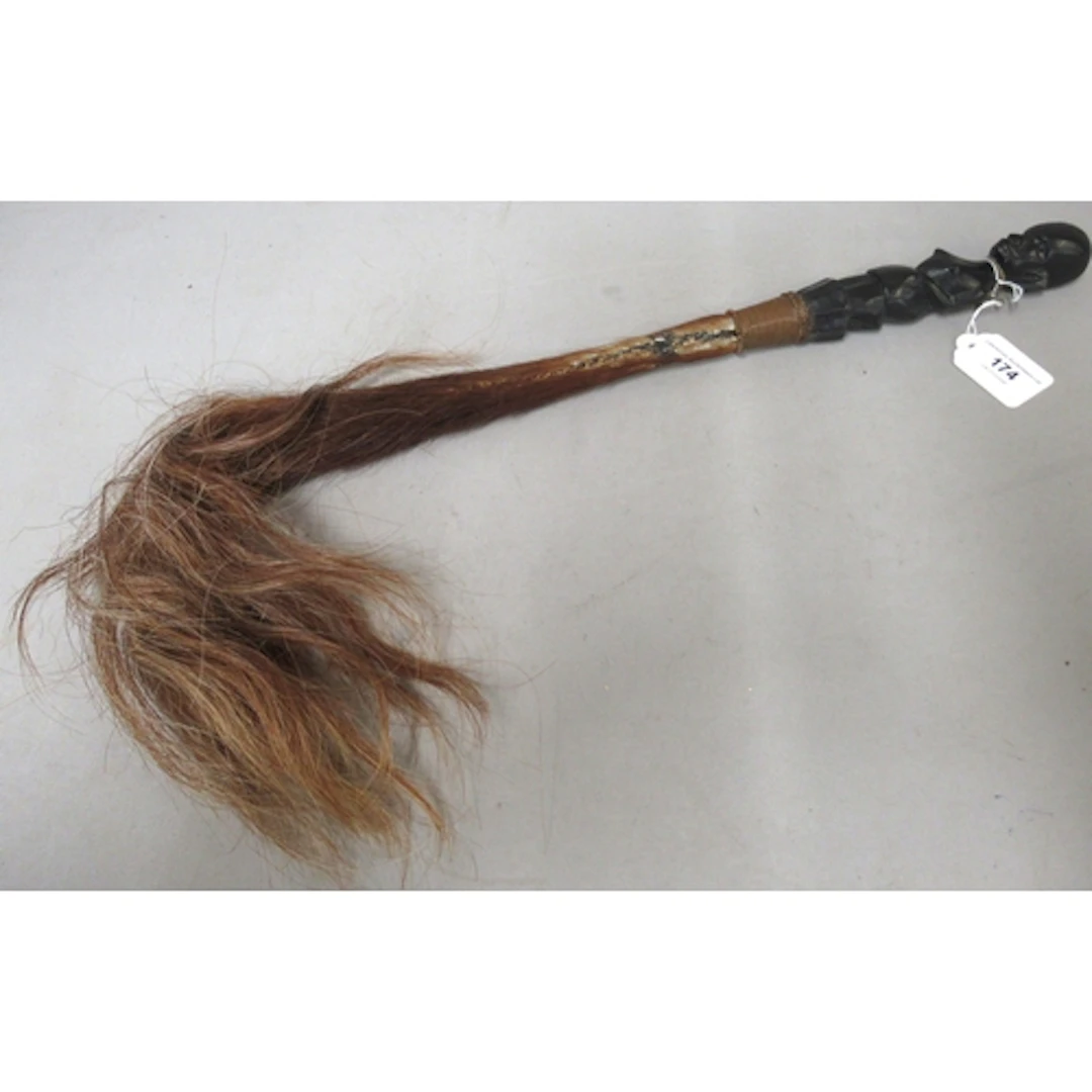 African tribal fly whisk with carved ebony figural handle