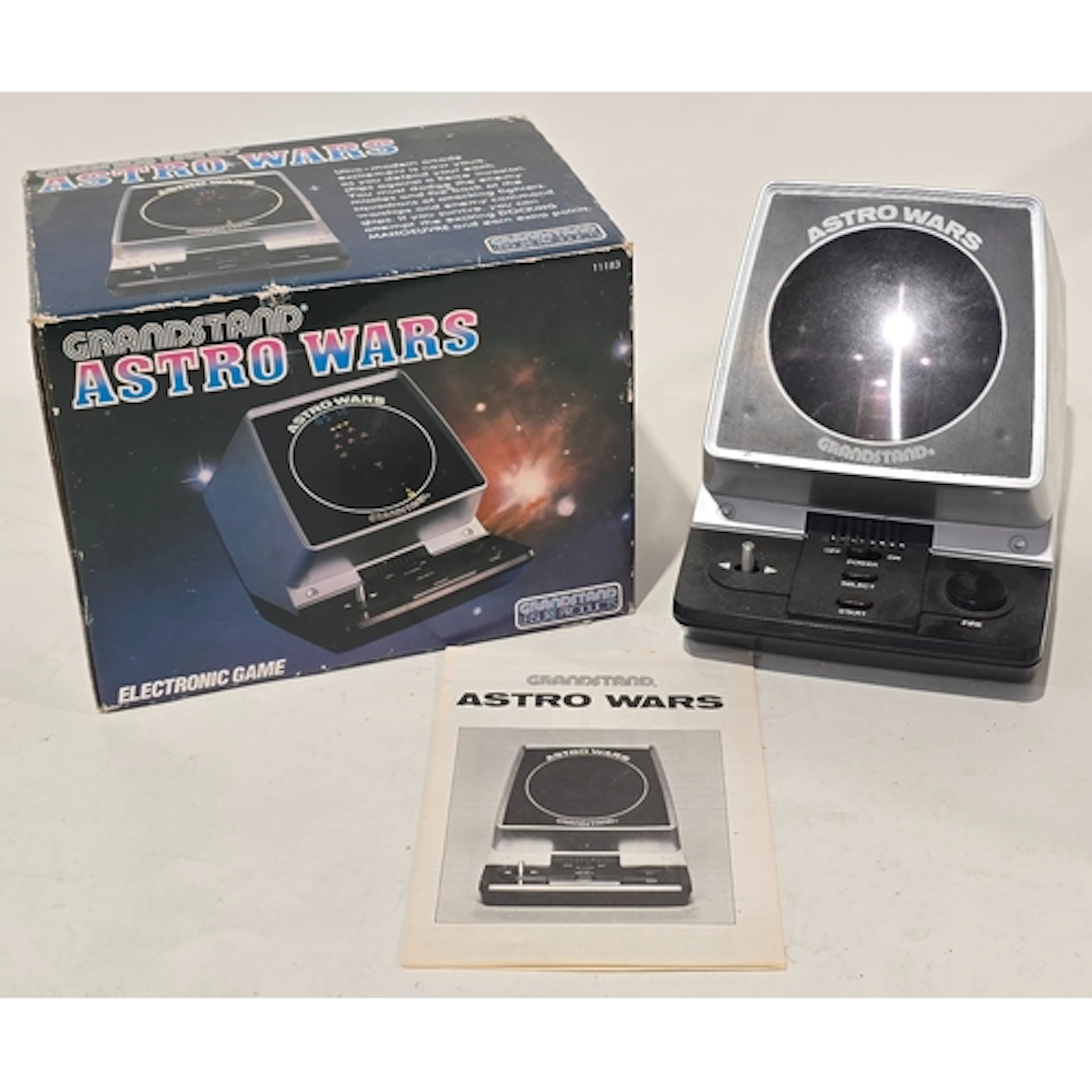 A vintage Grandstand Astro Wars Electronic Game c/w original...