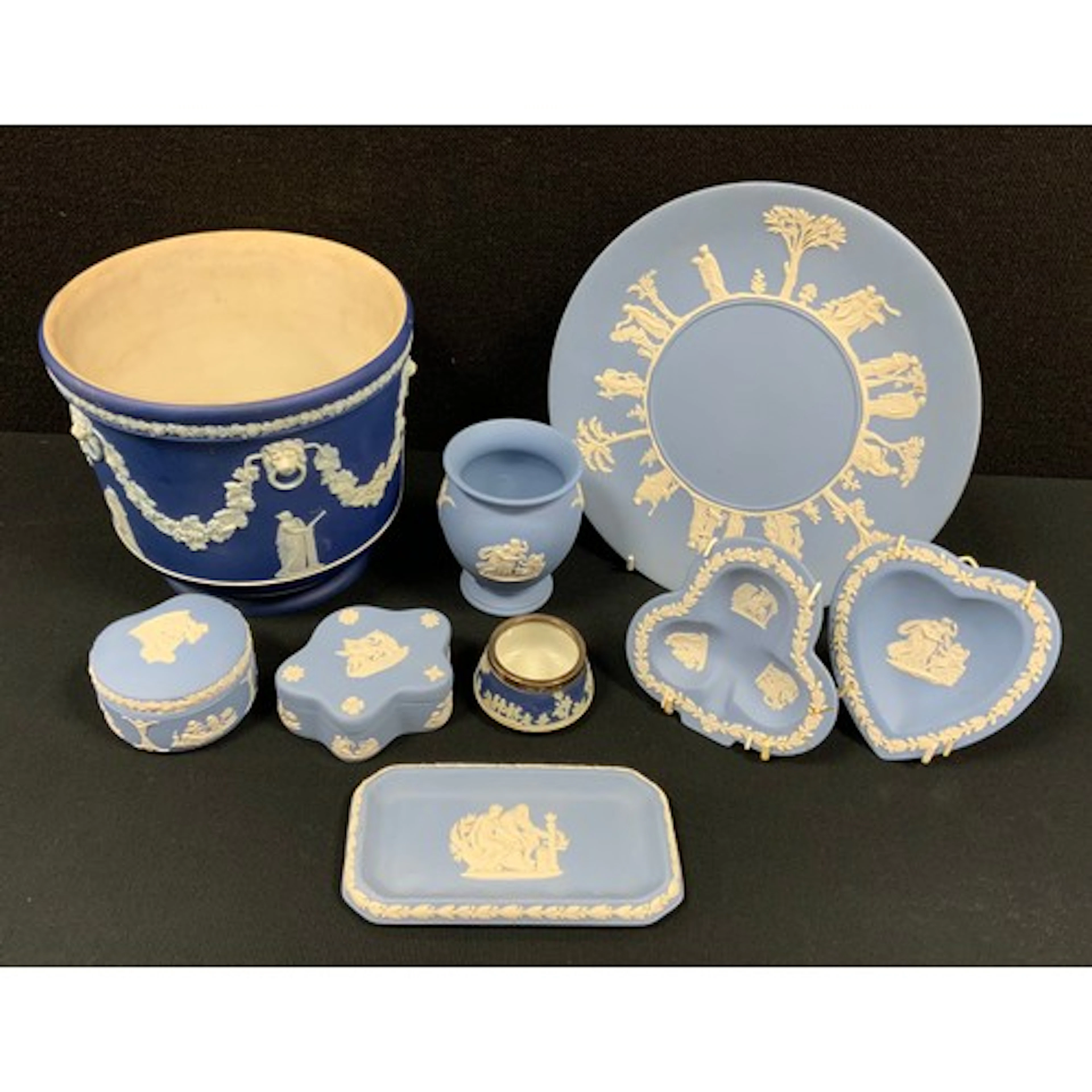 A Wedgwood jasperware planter decorated with lion head and ...