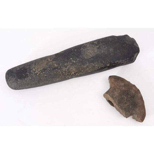 A possibly Neolithic axe head of elongated oblong form, fini...