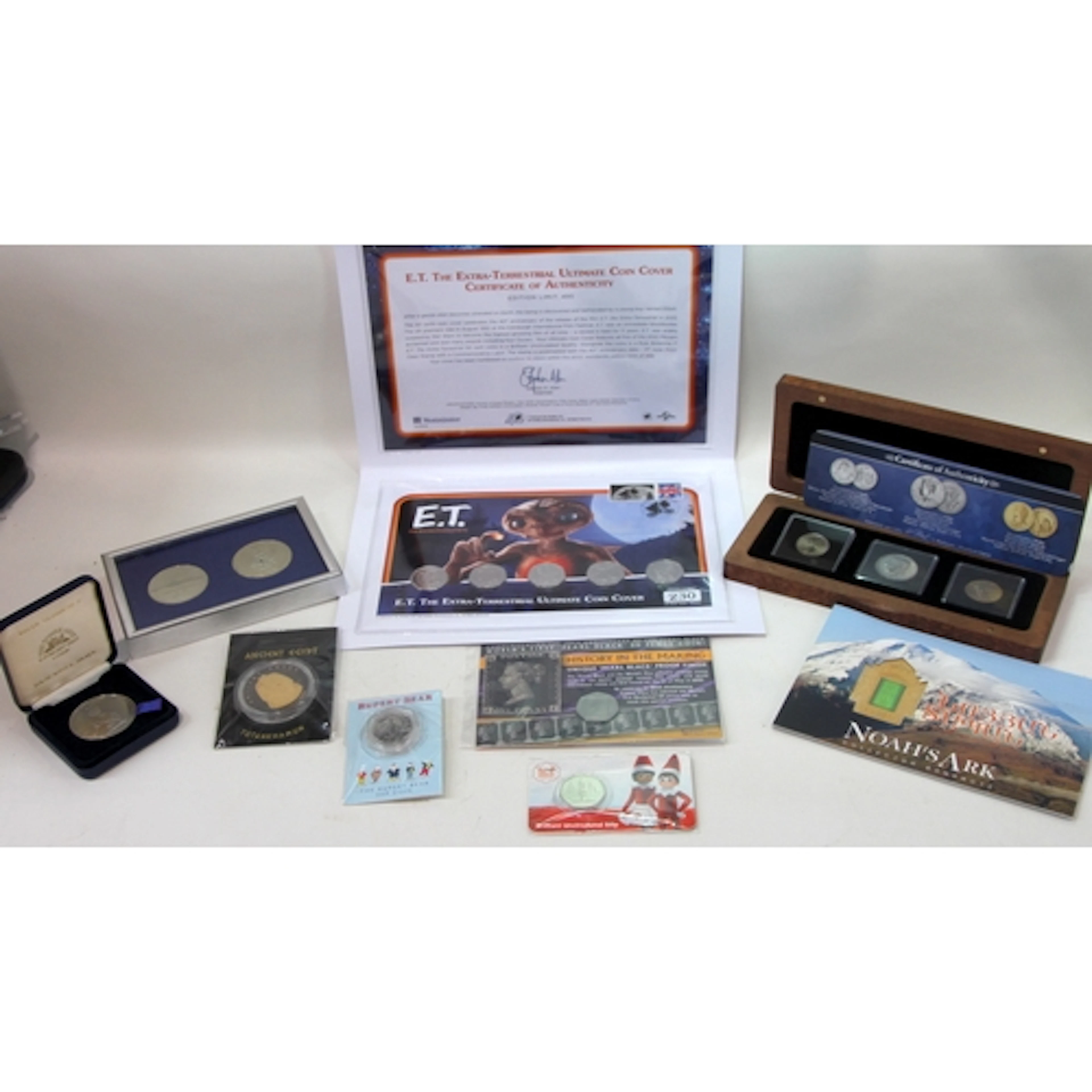 A collection of carded special edition coins and commemorati...