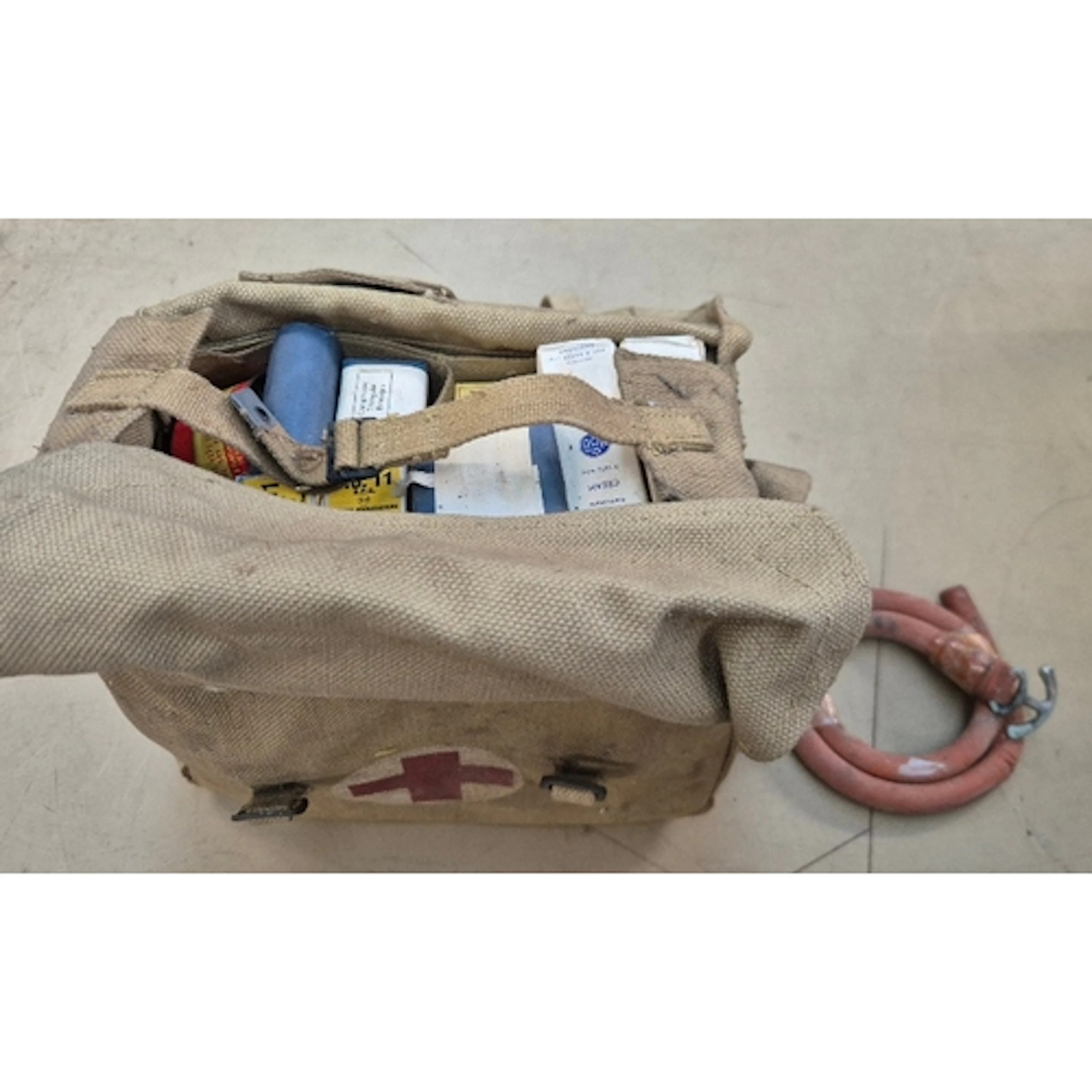 A 1944 British surgical haversack with contents.
