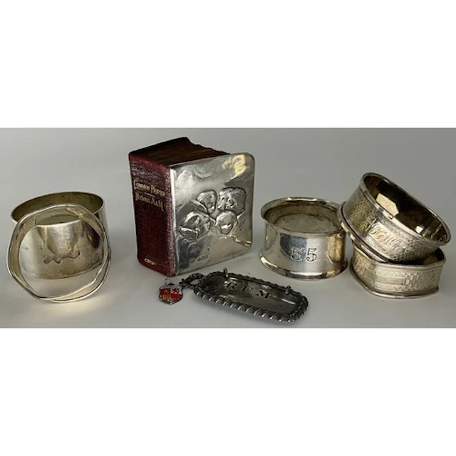 Silver - four assorted napkin rings, 64g, silver fronted hy...