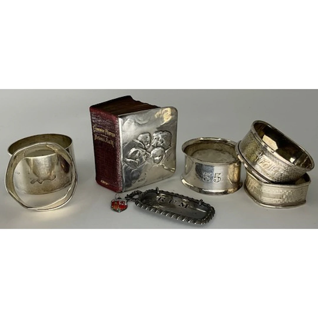 Silver - four assorted napkin rings, 64g, silver fronted hy...
