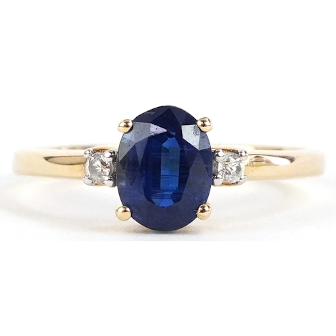 10K gold blue and clear stone ring, size R, 2.2g.